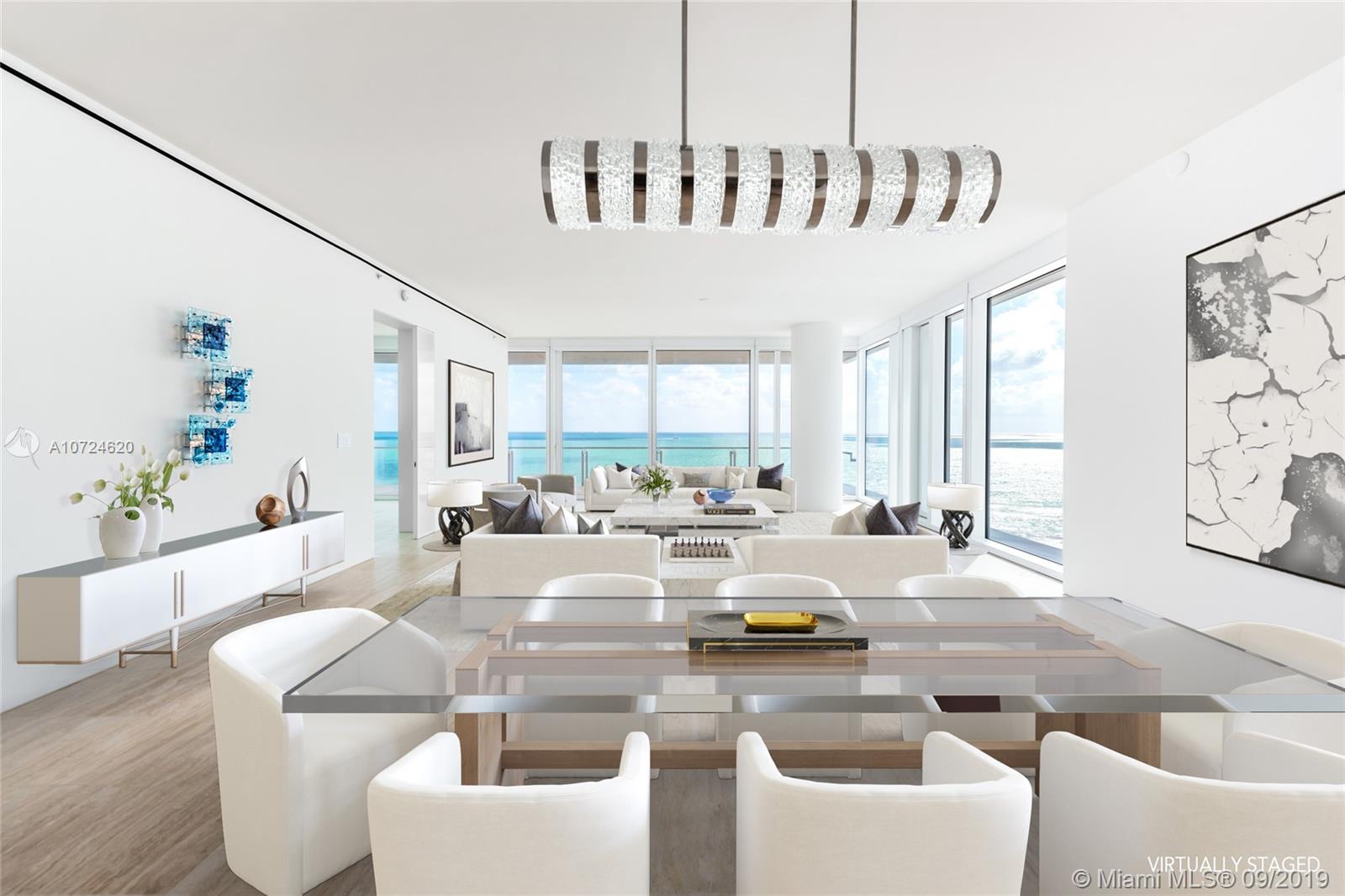 3 Bedroom flow through style residence exclusively designed by Richard Meier at The Surf Club Four Seasons. Offering sunrise views of the ocean and lush tropical gardens as well as sunset views of the city and bay. Enjoy the beautiful lighting rom this southeast corner residence. MBR and LR face the ocean. Experience 5-star service throughout the property. 9 Acres of land and over 816' of oceanfront property. Amenities include 4 pools, 2 residents only fitness centers, Le Sirenuse Restaurant and Champagne Bar, The Surf Club Restaurant by Thomas Keller and Four Seasons Kids Club & FS Spa. 24hr concierge services throughout the property including in house dining, maid service and many more.