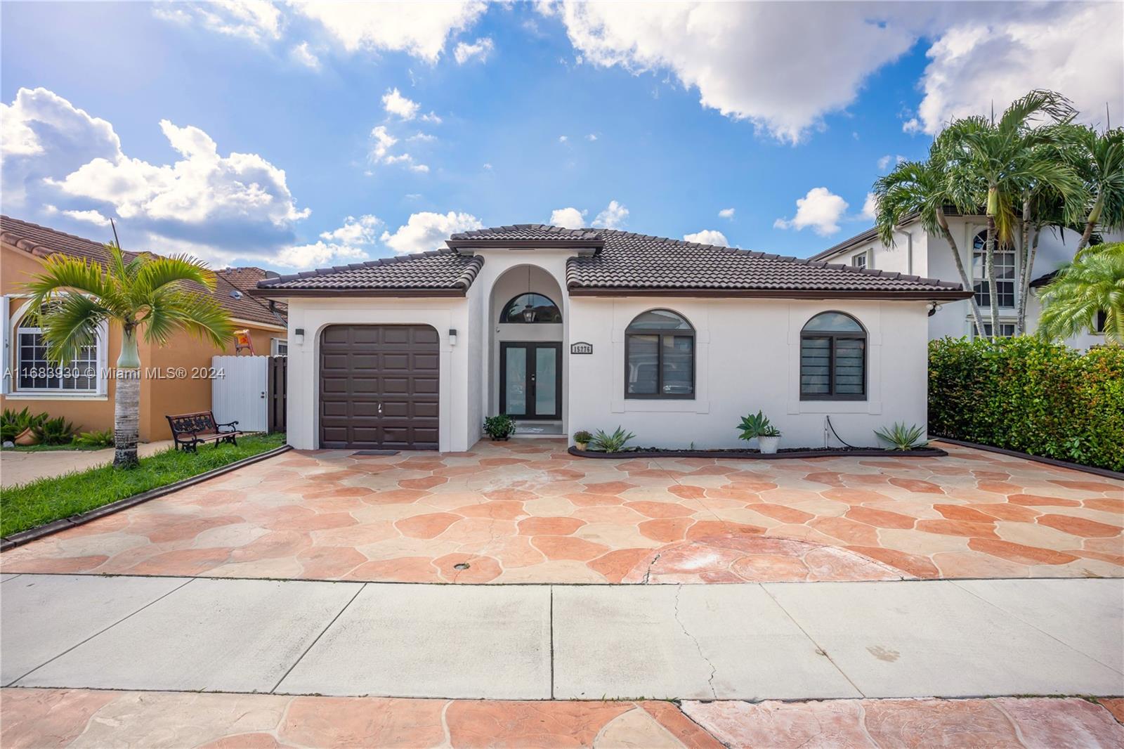 Rare elegant 1-story home in the heart of Venezia, this immaculately designed residence offers a luxurious lifestyle with its 4 bedrooms, 3 bathrooms, & 1-car garage + 5 Car driveway. Over $160K in upgrades! Everything inside was redone 2 years ago, tile floors, bathrooms, lights, impact windows & doors, baseboards kitchen, water heater appliances, LED Lights, Exterior & Interior paint, bedroom doors & more. With high volume ceilings in the entrance, leading into a formal living & dining room perfect for entertaining guests. Family room & upgraded kitchen featuring quartz countertops will impress.  The outdoor area features a fenced yard & covered porch. Don't miss out on the opportunity to experience the elegance of this exquisite home. Schedule your private showing.