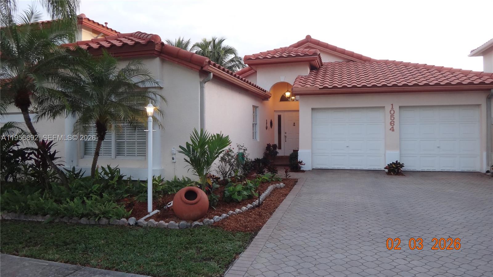 Charming one-story home in the highly desirable community of Doral Sands, a gated community with very low HOA. High-quality upgrades throughout with marble floors, wood cabinets, granite & marble tops, stainless. Roof tiles were replaced in 2021. Patio with beautiful ornamentals and fruit trees is ideal for entertainment: concrete pavers, brick BBQ, fountain, covered roof with fan, swings and lights. Doral Park Country Club offers restaurant, sport bar, gym, sauna, pool, jacuzzi, tennis & pickleball courts, and a beautiful children's playground. Doral, considered a premier location with family-friendly neighborhoods and luxury living, is often ranked for its high quality of life, top-rated schools, booming business environment, parks, diverse dining, and entertainment options.