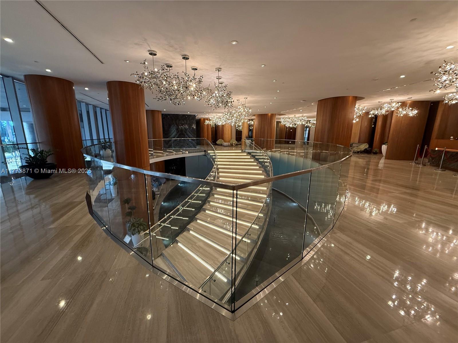 Discover unparalleled luxury at the sought-after Aria on the Bay! This beautiful 2-bedroom, 2.5-bath condo offers spacious, modern living with stunning views of the city skyline and serene bay waters. The open-concept floor plan connects the living, dining, and kitchen areas, featuring high-end finishes throughout.  The gourmet kitchen is equipped with sleek stainless steel appliances, premium countertops, and ample cabinetry. Expansive windows flood the space with natural light, creating an airy and inviting atmosphere. The condo also offers generous closet space, an in-unit washer/dryer, and a private balcony for enjoying the views in style.  Aria on the Bay’s exceptional amenities include two sparkling pools, a state-of-the-art fitness center and a luxurious spa.