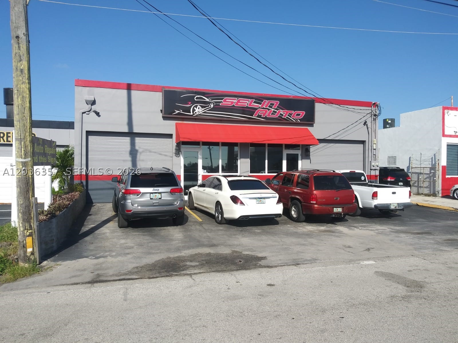 Turnkey automotive facility strategically positioned directly on N Dixie Highway in Hallandale Beach, offering strong visibility and accessibility for collision repair, mechanic, auto dealer, service, and related automotive uses. Situated on a ±13,753 SF lot with a ±4,850 SF warehouse, the property features 15’ ceilings, two street-level roll-up doors, built-out office/waiting area, warehouse/storage space, and a fully fenced-in rear lot. Existing Collision, Mechanic, and Auto Dealer licenses provide immediate operational capability for a move-in-ready automotive business opportunity in a strong East Hallandale Beach location.