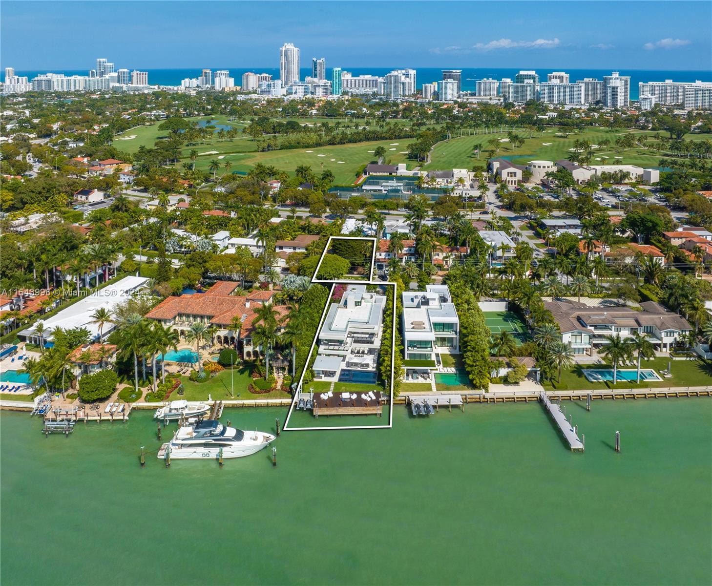 Incredible opportunity to own two luxury homes on coveted North Bay Road and dive into the ultimate Miami Beach lifestyle! Acquire 5718 N Bay Rd, a spectacular waterfront mansion with breathtaking views of Miami’s skyline and 5725 N Bay Rd, a remodeled 4-bedroom, 4.5-bath home. Entertain across both properties, offering a total of 11 beds, 11 baths, 11,012-SF of living space, 24,086-SF of land, and 75-FT of prime waterfrontage. 5718 N Bay Rd represents the epitome of luxury living, boasting expansive open living areas, exceptional outdoor spaces, and a wealth of lavish amenities! Indulge on dreamy sunsets from your rooftop, private screening in your home theater, and have unforgettable parties on the bayfront! Elevator, gym, Savant system, 4-car garage, generator.