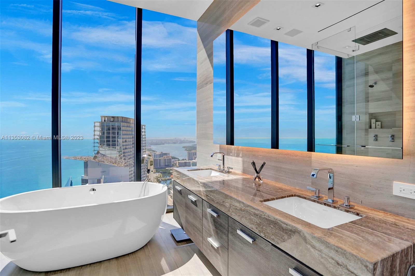 Welcome to a truly unique Boutique Residence of MUSE. High above any neighboring buildings, you may find yourself living in A One-of-a-Kind, Luxury Smart Home on the 47th Fl. Which offers you an unobstructed Panoramic Ocean & Intracoastal views from every room. This 2BR +Den, that can be converted into a 3RD BR, boasts 3 Full Baths. You will find exquisite marble flooring throughout the unit, surrounded by wall of windows along with 12ft. ceilings. Top-of-the-line appliances such as WOLF & Sub-Zero and fixtures Dornbracht & Duravit makes this a remarkable home. Outdoors living consists of a 60ft wide and 36ft deep balcony with a Summer Kitchen for entertaining year round. Enjoy the finest Amenities such as the Infinity Pool & Lounge, Spa, Gym, Beach Service & Resort like Concierge.
