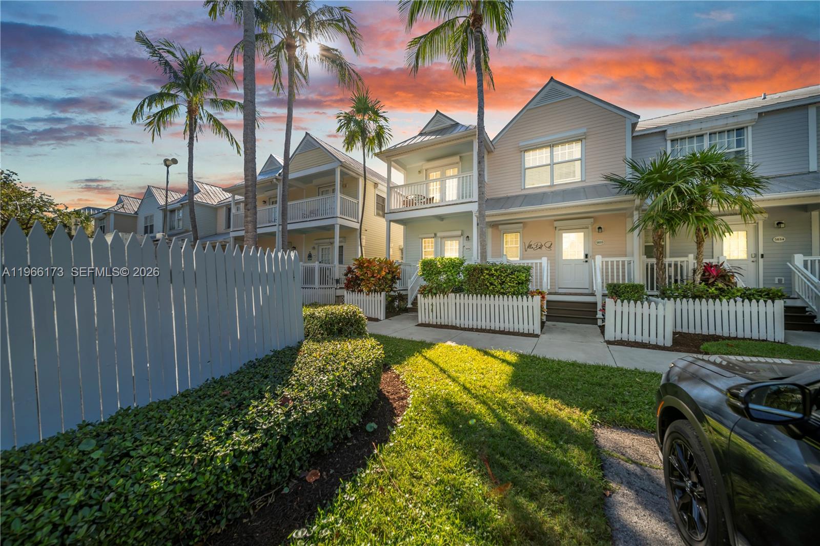 Waterfront villa located at Hawk's Cay Resort, positioned on wide open blue-green waters with unobstructed sunset views. This townhome sleeps six and offers both personal use and income potential.

Recent updates include a full exterior refresh and new flooring throughout the unit. Additional improvements include 4K Samsung HDTVs, an updated refrigerator, and A/C replacement (2018). Interior features granite countertops, stainless steel appliances, beach-style décor, and serviced roll-down/accordion shutters. All bedrooms are located on the second floor, each with access to one of four private balconies. Located near the marina and Angler & Ale Restaurant. Owners may participate in the Hawk’s Cay Resort Preferred Rental Program to access resort amenities, including multiple pools, spa, fitness center, tennis, saltwater lagoon, restaurants, and children’s activities.