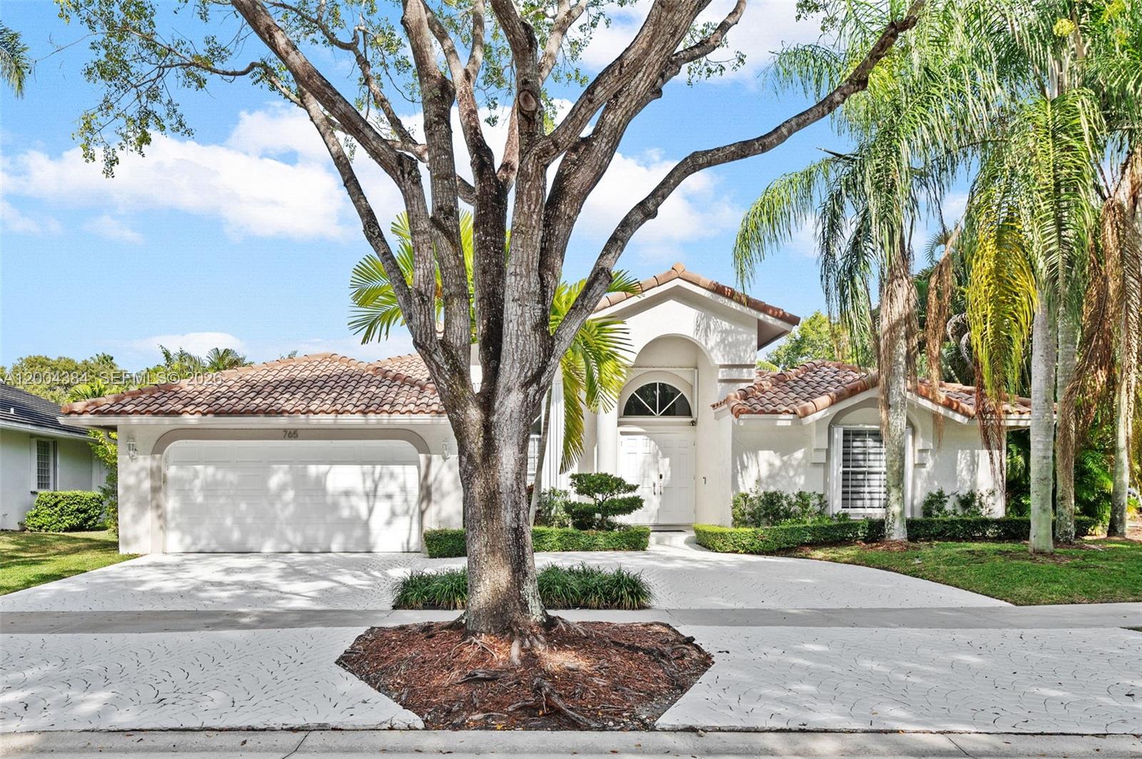WELCOME TO YOUR DREAM HOME IN THE PRESTIGIOUS ORCHID ISLAND COMMUNITY OF WESTON. OFFERING 5 BEDROOMS, A DEDICATED OFFICE, AND 3.5 BEAUTIFULLY UPDATED BATHROOMS, THIS HOME EFFORTLESSLY BLENDS MODERN STYLE WITH EVERYDAY COMFORT. THE FULLY RENOVATED KITCHEN SERVES AS THE HEART OF THE HOME, FEATURING AN OPEN-CONCEPT LAYOUT THAT SEAMLESSLY CONECTS THE COOKING, AND DINING LIVING AREA. HIGHLIGHTS INCLUDE SLEEK WHITE CABINETRY, QUARTZ COUNTERTOPS, STAINLESS STEEL APPLIANCES, AND A BUILD-IN WINE COOLER PERFECT FOR BOTH ENTERTAINING AND DAILY LIVING. ABUNDANT NATURAL LIGHT FILLS THE INTERIOR, ENHANCING THE HOME'S WARM AND INVITING ATMOSPHERE. STEP OUTSIDE TO AN EXPANSIVE BACKYARD DESIGNED AS A PRIVATE RETREAT, COMPLETE WITH A SALTWATER POOL, CLUSIA HEDGES THAT PROVIDE EXCEPTIONAL PRIVACY CREATING A SERENE OUTDOOR OASIS. ADDITIONAL FEATURES INCLUDES BRAND NEW WATER HEATER, 2 YEARS OLD A/C