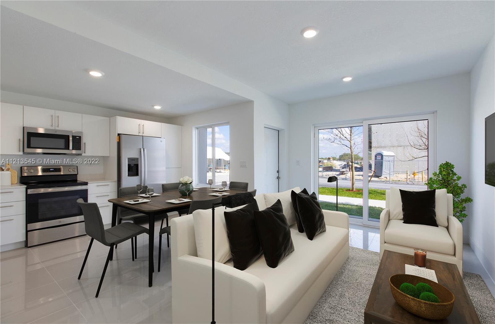 New construction townhouse move-in-ready. Developer closed out. 4 bedrooms,3.5 baths,2 parking spaces,& rooftop terrace. Concrete structure,impact windows & doors,porcelain tile on all areas. Modern open kitchen with stainless steel appliances,granite or quartz counter top,& wood cabinets. Master with walk-in closet on first floor.Second floor with master,walk-in,washer & dryer,wood floors, tankless water heater,balcony.This unique model has a beautiful large skyview terrace where you can enjoy an outdoor living! Modern townhouse community centrally located with easy access to Turnpike and US-1.NO CDD,FHA ELIGIBLE. Conventional and VA loans are eligible. Now offering great incentives to buyers. Request your showing today. Developer owned property. Builder warranty included!