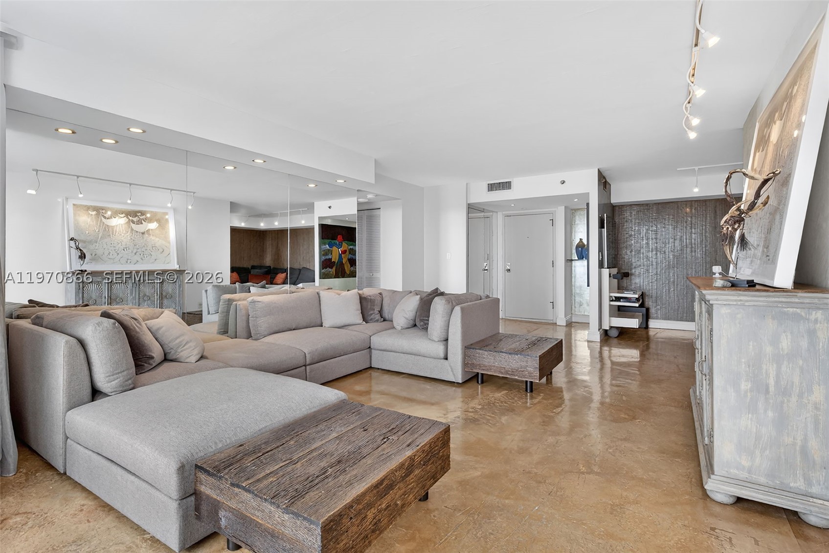 Back on the Market! Completely remodeled 1-Bedroom + den, 1.5-bath showcasing breathtaking SE views of Biscayne Bay, Miami skyline, and Miami Beach. This turnkey apartment is offered fully Furnished with custom-made pieces (artwork excluded) and has been meticulously upgraded from top to bottom. Highlights include newly installed impact Storm Windows, custom shades, stained concrete floors, and elegant Venetian plaster walls. The fully renovated kitchen features terrazzo countertops and new appliances. Spa-inspired bathrooms include a soaking tub, while additional upgrades such as a newer A/C system, LED lighting with dimmers throughout, and a custom-designed primary closet ensure both comfort and style. No detail has been overlooked. Simply bring your toothbrush and move right in. The unit also includes Two Parking spaces and has No Assessments. Set within a luxury waterfront community, residents enjoy world-class amenities including a full-service spa, tennis courts, fitness classes, indoor and outdoor pools, marina, on-site restaurants, 24/7 security, high-speed internet, and cable — all included in the maintenance fees. A must-see and Easy to Show!