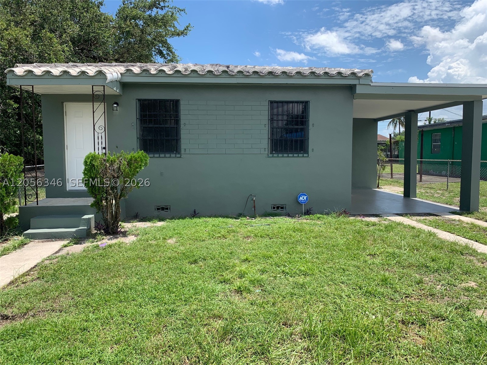 Welcome to this beautifully updated 2-bedroom, 1-bath single-family home offering comfort, convenience, and plenty of outdoor space. Inside, you'll find tile flooring throughout, a modern kitchen and bathroom, and central air conditioning for year-round comfort. The home also features an electric range, refrigerator, and a laundry room with washer/dryer hookups for added convenience.

Step outside to enjoy the expansive, fully usable backyard—perfect for entertaining, relaxing, or creating your own outdoor retreat. A carport and additional driveway parking provide ample space for multiple vehicles.

Conveniently located near major highways, shopping, dining, schools, and public transportation, this move-in-ready home offers easy access to everything Miami has to offer.

Available for immediate occupancy. Don't miss this opportunity to make this charming home yours!