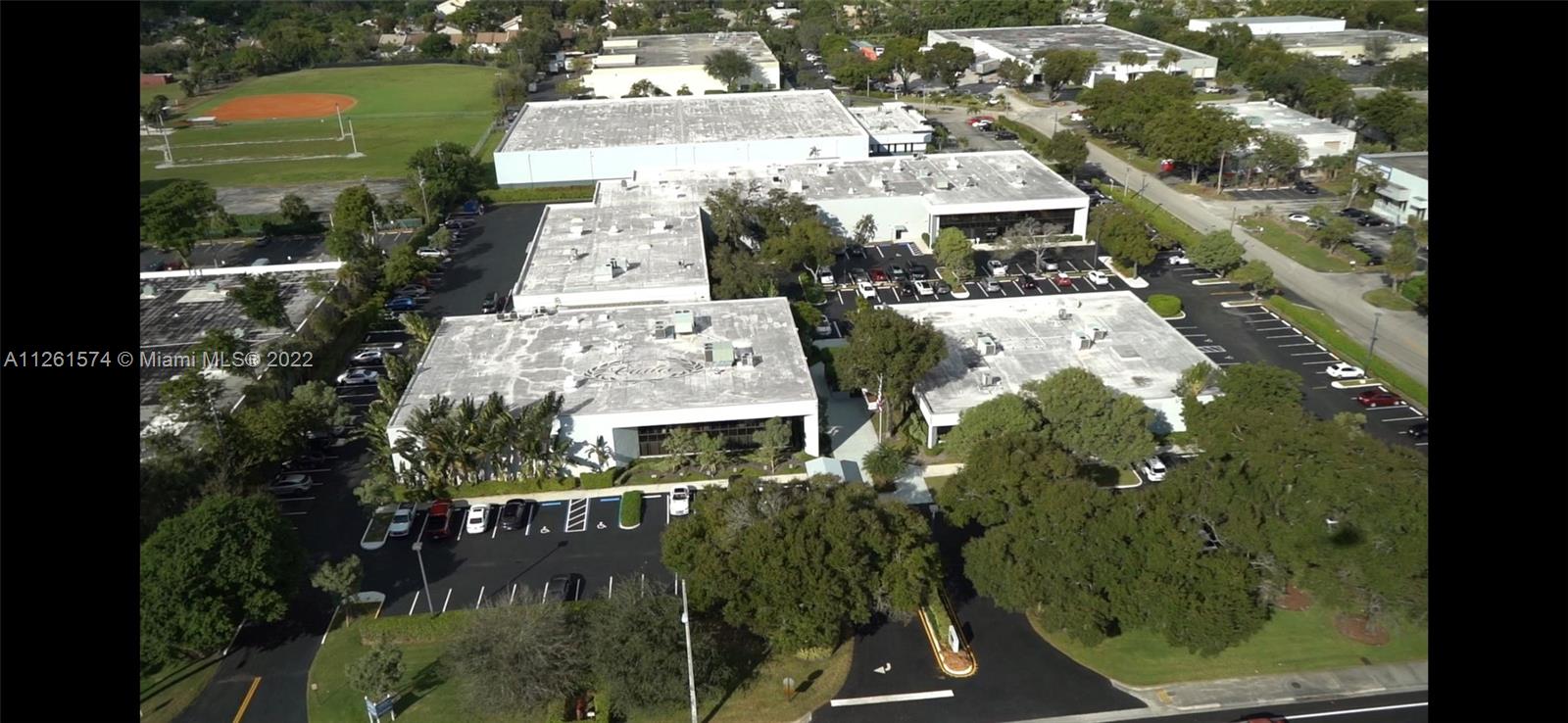 Exquisitely maintained grounds. On site property management, immediate availability on this 1st floor office suite. Private entrance with ample parking and 24/7 access. Close proximity to all major South Florida Highways. 5500 sq. ft with private kitchen/dining area and restrooms. AIP zoning, Full back up generator. Landlord will consider helping with a build-out depending on the term of the lease. Please call listing agent to schedule appointment for showing. Also have available 2 other units in separate building Unit 400 (885sq. ft. @ $14/sq. ft.) and unit 100 (1053 sq. ft. @ $26/sq. ft.)