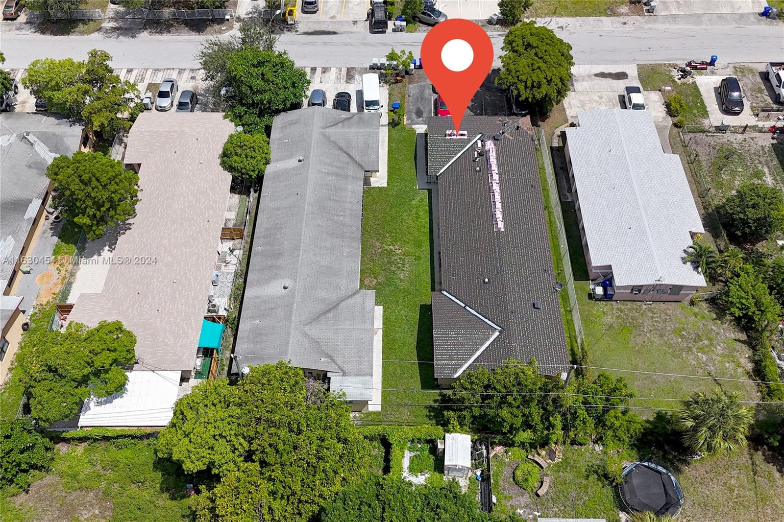 Duplex with a MEGA  BONUS! The Layout of this Multifamily Gem consist of, 4/2, 2/1, 1/1 , turn key investment. Property has 4 meters and can be easily converted into a 4 unit building. New Roof, paint, accordion shutters. Parking spaces for all tenants. Property also comes with a coin laundry generating $500/M. Seller is selling the building next door 220 NW 12th ST as package deal, total of 7units ( potentially 8).All tenants have leases in place,  Do not miss out on this great investment opportunity! Contact Listing Agents with any further questions.