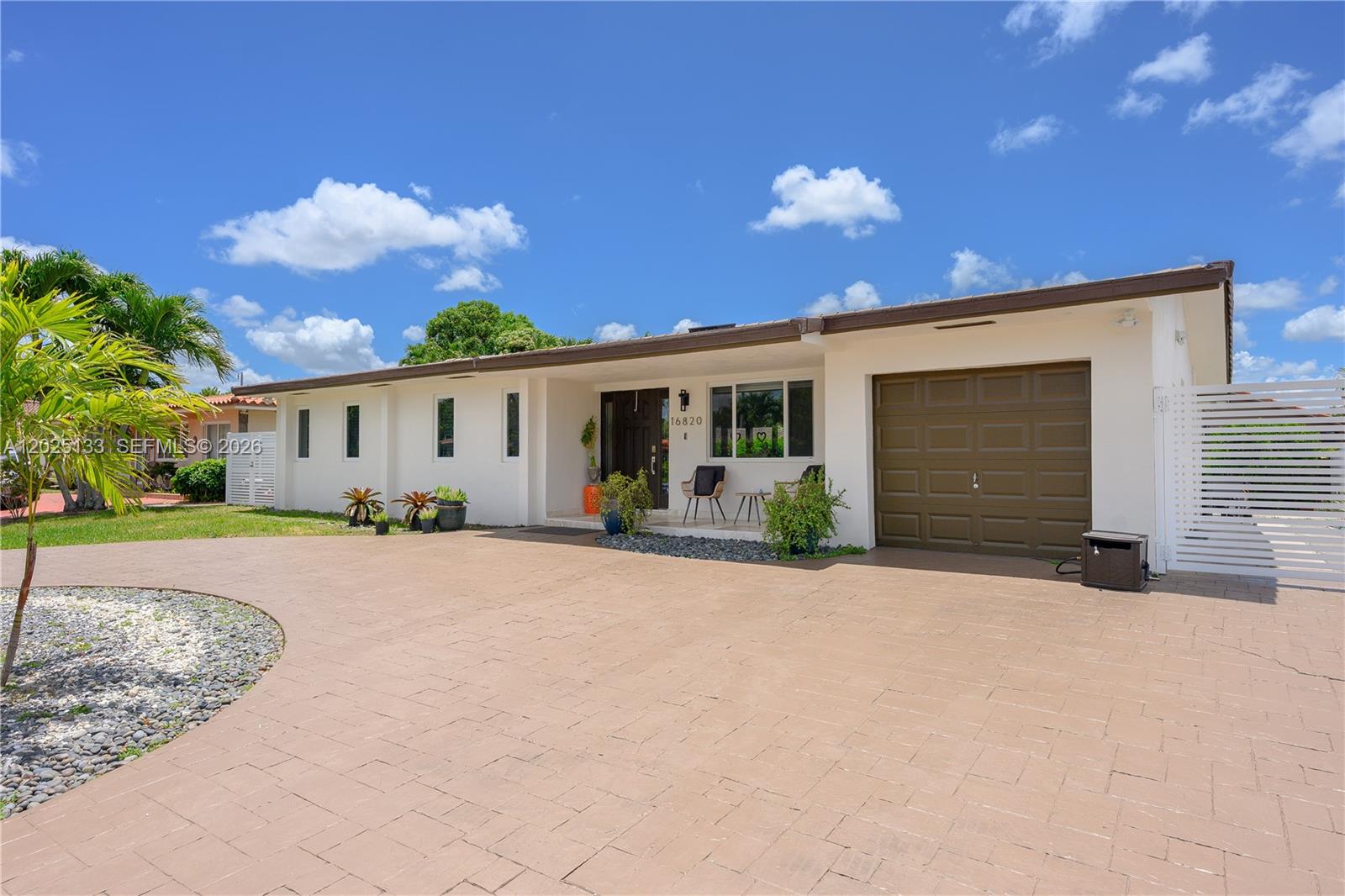 Beautifully updated 3BR/3BA single-family home tucked away on a quiet cul-de-sac. This move-in ready residence features impact windows, doors and skylights throughout, a newer roof (2024), PVC plumbing replaced in 2021, and a fully updated A/C and duct system installed in 2021. The bright, open layout offers spacious living areas, an updated kitchen, and seamless indoor-outdoor living. Enjoy a large backyard with plenty of room to entertain or relax, plus the convenience of a one-car garage and expansive circular driveway. A well-maintained home with major upgrades already completed.