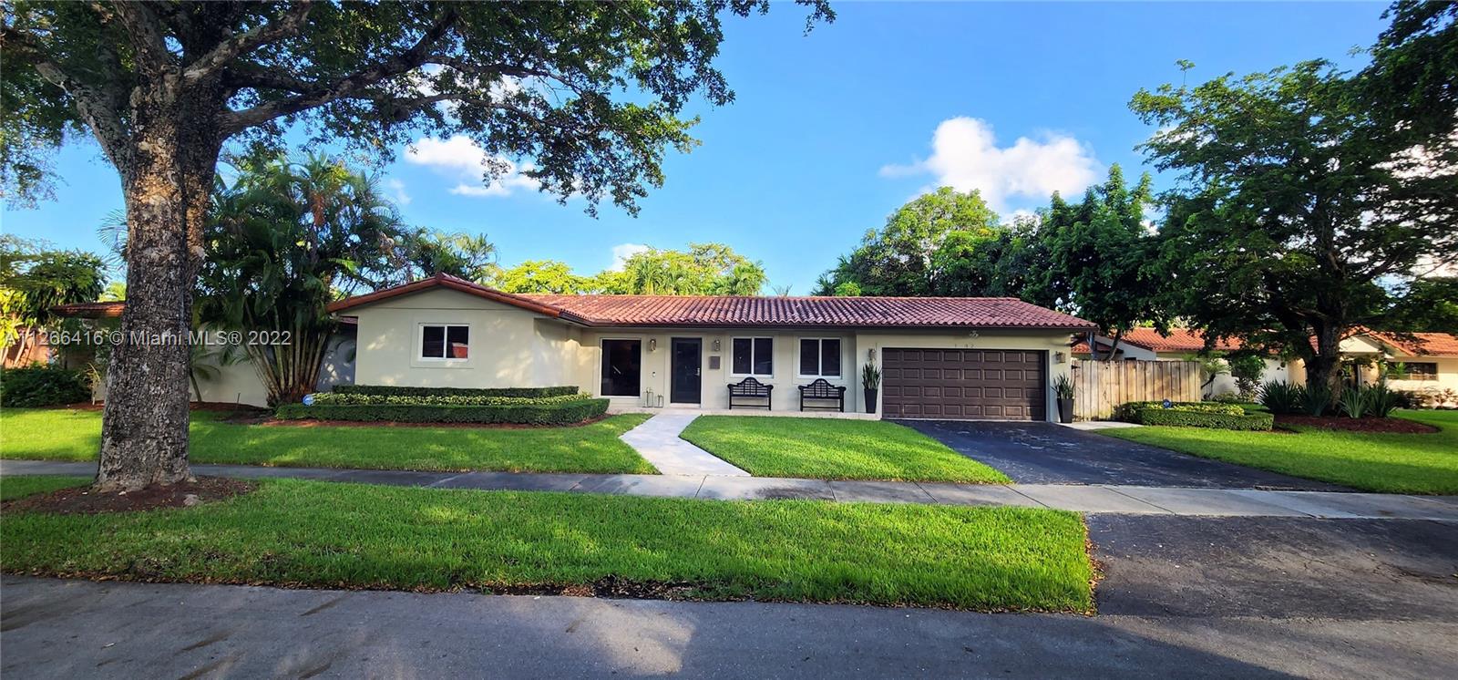 Located in the highly desirable area of Miami Lakes, this property is one you definitely don't want to miss out on!   Featuring a freshly painted exterior along with a double car garage, impact windows and doors throughout the entire home, property is in a cul-de-sac and loaded with luxurious options. Kitchen is equipped with granite countertops and real wooden cabinetry and will come with stainless steel appliances.  Property has two masters and two regular rooms (one of the five bdrm was converted into a custom walk in closet for one of the master rooms).  High hat lighting throughout the kitchen, living room, and dining areas. Pool deck is keystone tile and has a brand new pool pump.  All rooms feature custom walk-in closets.  Schedule your viewing now, this will not last long.