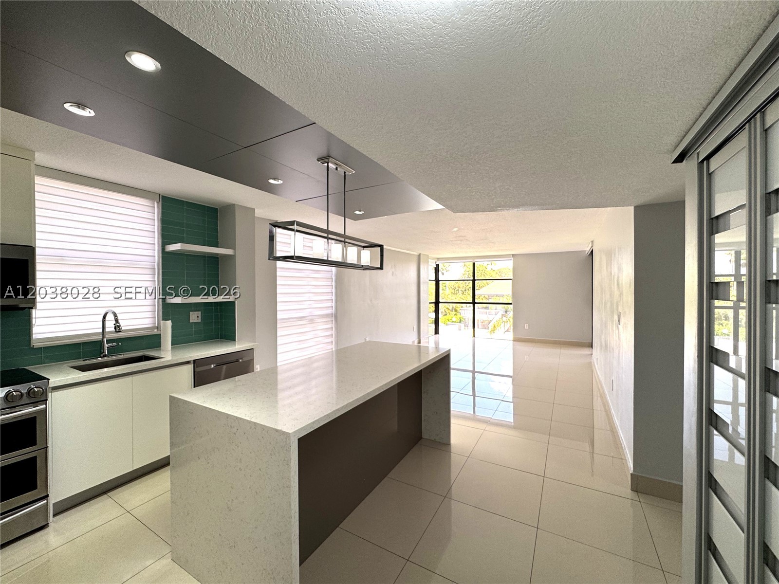 Enjoy resort-style living in this beautifully updated condominium featuring breathtaking views of the pool, clubhouse, tennis courts, and basketball court from both the living area and bedrooms. The spacious floor plan offers abundant natural light and a large private balcony where you can relax and enjoy the same stunning views.
The modern kitchen boasts contemporary finishes, ample cabinet space, and an open layout that flows seamlessly into the living and dining areas, making it perfect for entertaining. For added convenience, the unit includes an in-unit laundry room and two assigned parking spaces.
Located in a well-maintained community with excellent amenities, this residence combines comfort, convenience, and lifestyle. Whether you're enjoying your morning coffee on the oversized balcony or taking advantage of the community's recreational facilities, this home offers a unique opportunity to experience the best of South Florida living