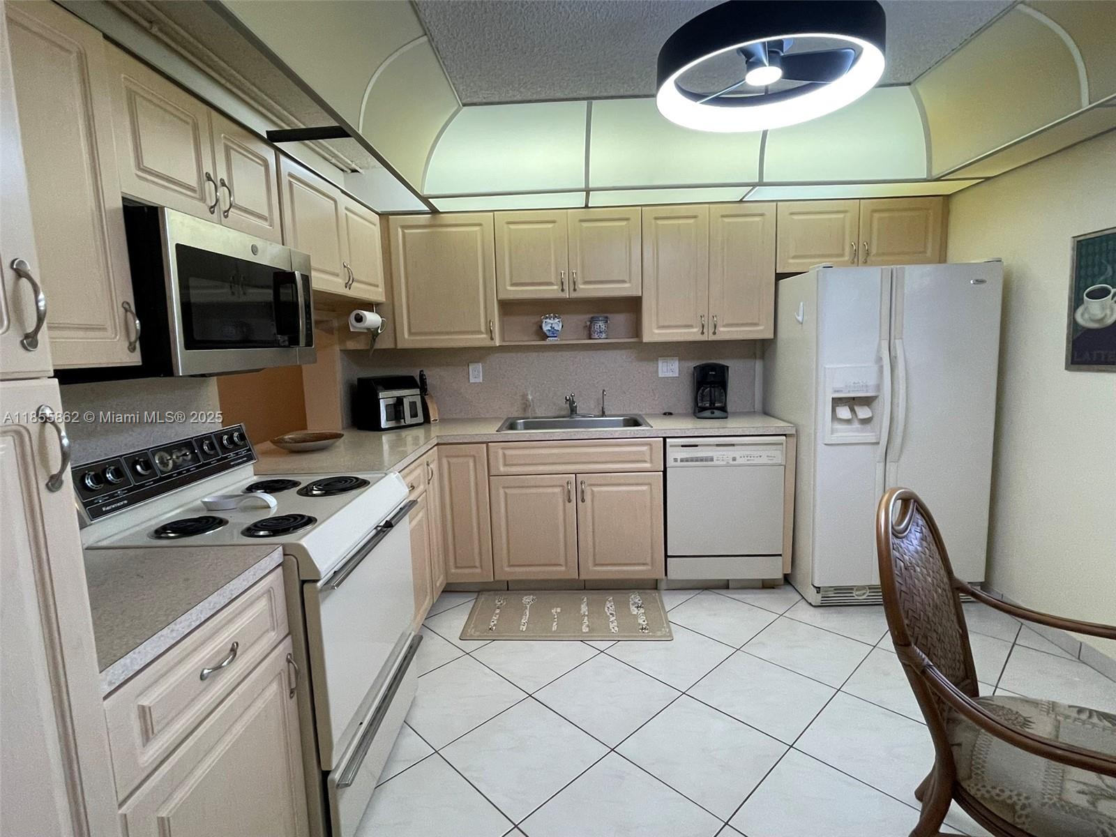 ENJOY YOUR MORNING COFFEE OR EVENING COCKTAILS ON THE BALCONY OF THIS SPACIOUS 2 BED/2 BATH UNIT, OVERLOOKING THE CANAL, IN THE LAKES OF CARRIAGE HILLS!  LARGE, REMODELED KITCHEN W/LOTS OF CABINETS AND COUNTER SPACE. OVERSIZED SPLIT BEDROOMS WITH MASTER SUITE HAVING WALK IN CLOSET, DRESSING AREA AND WALK IN SHOWER.  RENOVATED SECOND BATH WITH TUB/SHOWER COMBO.  LAUNDRY ROOM WITH FULL SIZE WASHER AND DRYER AND MORE STORAGE SPACE! BREAKFAST NOOK W/PLENTY OF NATURAL LIGHT.  SPACIOUS LIV/DIN AREA, 55+ COMMUNITY WITH LOADS OF AMENITIES INC POOL, PICNIC AREA, TENNIS, CLUBHOUSE AND ASSOC FEE INC WATER, SEWER, TRASH, WIFI AND CABLE – ASSESSMENTS WILL BE PAID IN FULL AT CLOSING BY SELLER - DON’T WAIT ON THIS ONE – SCHEDULE YOUR SHOWING TODAY AND BRING US YOUR OFFER!!!