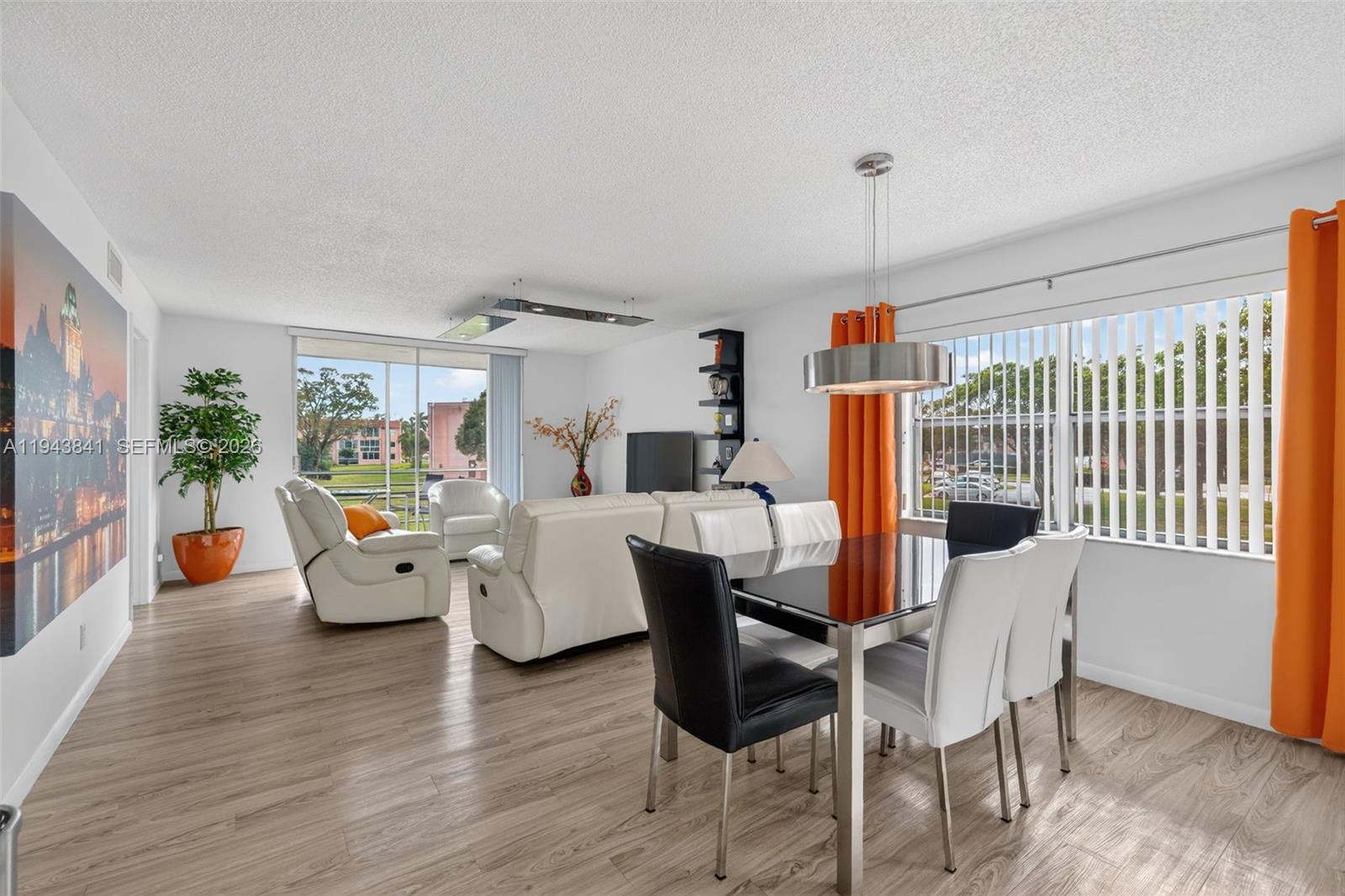 Beautiful corner unit with 2 bedrooms and 2 bathrooms, ideally situated directly on the golf course in Sunrise Lakes Phase 3. Filled with natural light from abundant windows, this bright and airy residence offers a screened balcony with serene golf course views and partial water views, creating a perfect indoor-outdoor living experience. The modern kitchen features stainless steel appliances, sleek gray cabinetry, and dark countertops. Offered fully furnished and turnkey, the home is tastefully decorated and includes custom, on-site built fixtures and new interior doors throughout, providing both style and quality craftsmanship. Located in a HOPA-verified community, Sunrise Lakes offers a maintenance-free lifestyle with internet and cable included in the HOA. Residents enjoy resort-style amenities such as unlimited free golf, clubhouse, billiards, pool, fitness center, game rooms, and an active Pickleball Club.
The building is well maintained with a newer roof installed two years ago and fully paid, renovated elevators, and strong overall upkeep. Move-in ready and offering exceptional value and lifestyle—this is an opportunity not to be missed.