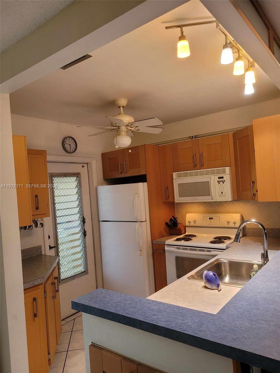 GLADIOLA GARDENS CONDO - Residential