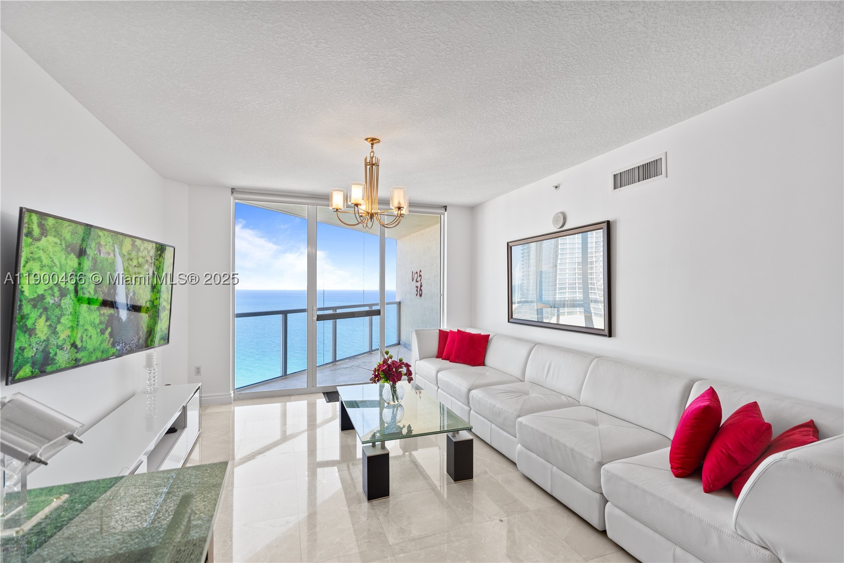 Beautiful 2-bedroom + den, 2.5-bath residence on the 36th floor of La Perla, offering 3 private terraces with incredible ocean, Intracoastal, and city views. This bright home features a split layout, floor-to-ceiling windows, marble floors, and an open kitchen. The spacious primary suite includes terrace access, a walk-in closet, and a spa-style bathroom. The den is perfect as an office or guest room. Resort-style amenities that include beach service, pool, fully remodeled with new equipped fitness center, jacuzzi, tennis courts, pool cabanas, concierge, valet parking, kids room, 24 hours security, upgraded lobby. Walking distance to all shops, restaurants, and public transportation. Minutes to Aventura Mall. Best schools, pets friendly. Flexible rental policy 12 times per year. Has assigned Self-Parking!