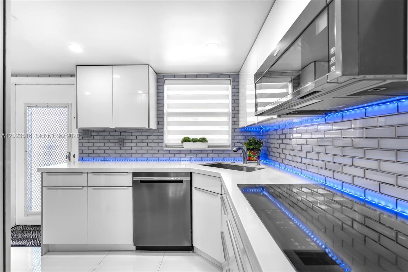 Welcome to this beautifully remodeled front canal view unit in the highly desirable community of Sunrise Lakes! This bright and modern residence features a sleek contemporary kitchen that creates a luxurious ambiance throughout the space. The open concept layout is filled with natural light and showcases pristine white tile flooring, updated finishes, and a clean modern design perfect for comfortable South Florida living. The spacious 1 bedroom and 1 bath complement the home’s stylish aesthetic. Conveniently located near shopping, restaurants, medical facilities, and major highways. A perfect opportunity to own a move in ready water view condo with modern upgrades and tranquil views in one of Sunrise’s most active adult communities!