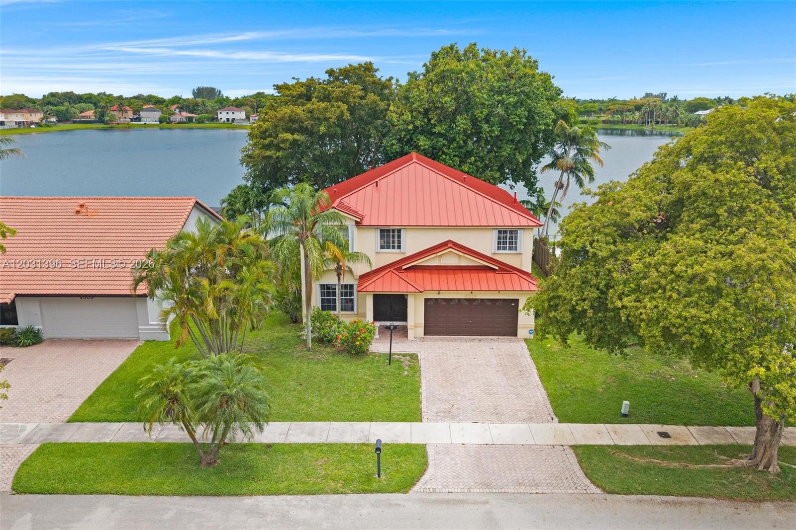 Welcome to waterfront living in the desirable Lakes by the Bay community! This spacious 2-story home offers 4 bedrooms, 2.5 bathrooms, and breathtaking lake views that create a peaceful retreat right in your own backyard. Thoughtfully designed with a functional layout, this home provides ample space for everyday living, entertaining, and a growing family. Enjoy bright living areas, generous bedrooms, and endless opportunities to customize the home to your personal style. Nestled in a centrally located, family-oriented neighborhood close to parks, schools, shopping, dining, and major highways. Whether you're enjoying a morning coffee overlooking the lake or unwinding after a long day, the picturesque setting makes every day feel like a getaway.