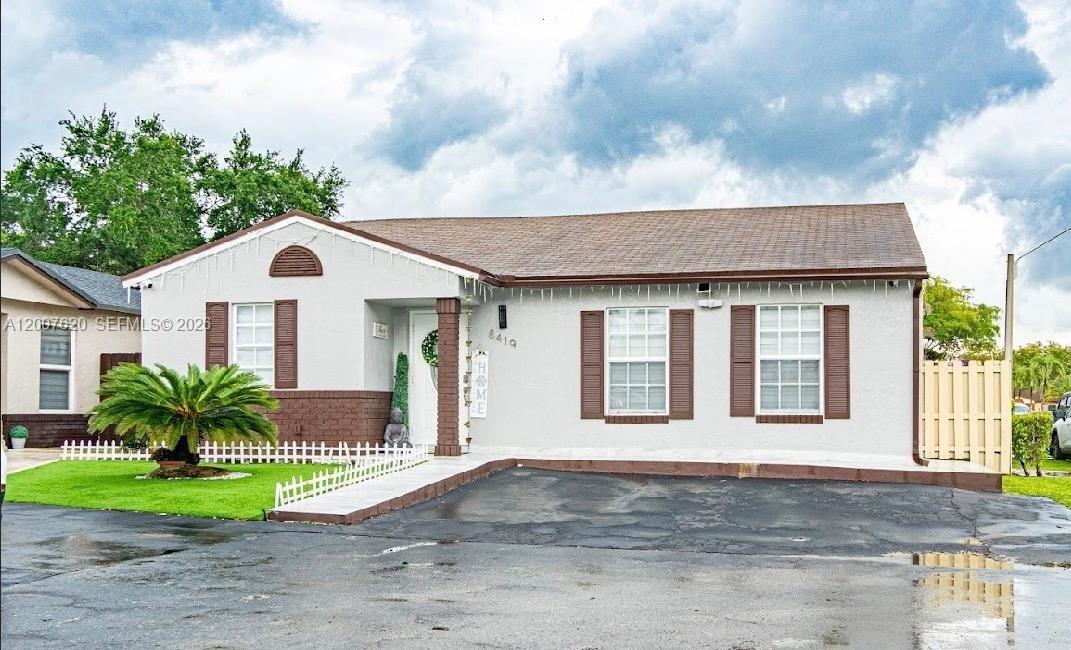 Beautiful, fully renovated single-story property featuring 3 bedrooms and 2 bathrooms, ceramic tile flooring throughout, elegant white kitchen cabinetry, and granite countertops. Stainless steel appliances with innovative technology. Located in a family-friendly neighborhood within the Westbrook community, near the Miami Lakes / Hialeah Gardens area. The community offers a children's playground and low Homeowners Association (HOA) fees. The property also includes a storage shed in the backyard, which is fully fenced. Contact us today to schedule an appointment. Don't miss the opportunity to make this your home—it won't last long on the market!