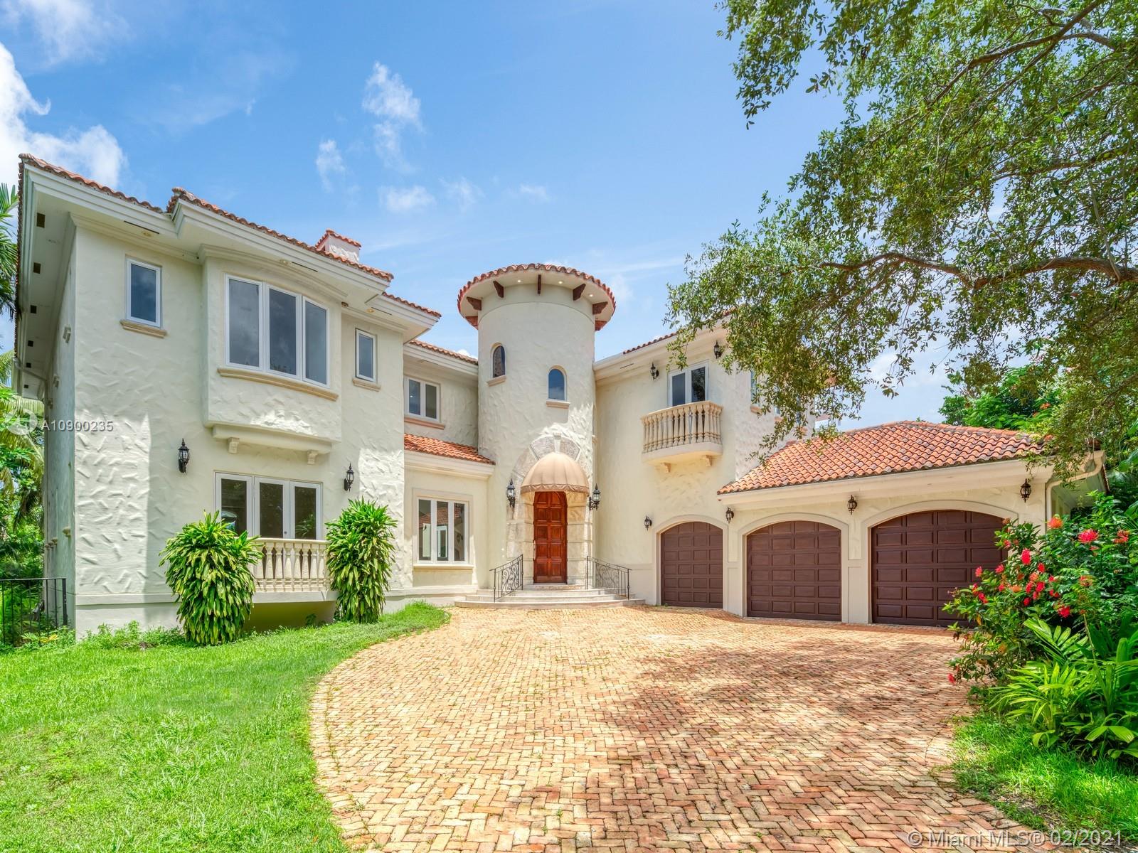 Gated and walled-in, this Islands of Cocoplum waterfront renovated estate has a grand staircase upon entry with dramatic volume ceilings. Brand-new marble floors flow throughout the living areas. Light-filled with high-impact windows. En-suite bedroom/office downstairs. A chic fireplace in the living room plus adjoining family room with a built-in bar and Cabana bath offer the perfect setting for relaxing or entertaining. Walk right out to the luxurious patio, expansive pool and covered porch for some sunny South Florida living. Split floor plan upstairs with the master on one side and 3 en-suite bedrooms on the other. The master bathroom offers two separate water closets. Separate maid’s wing downstairs provides privacy adjacent
to the laundry room and three-car garage.