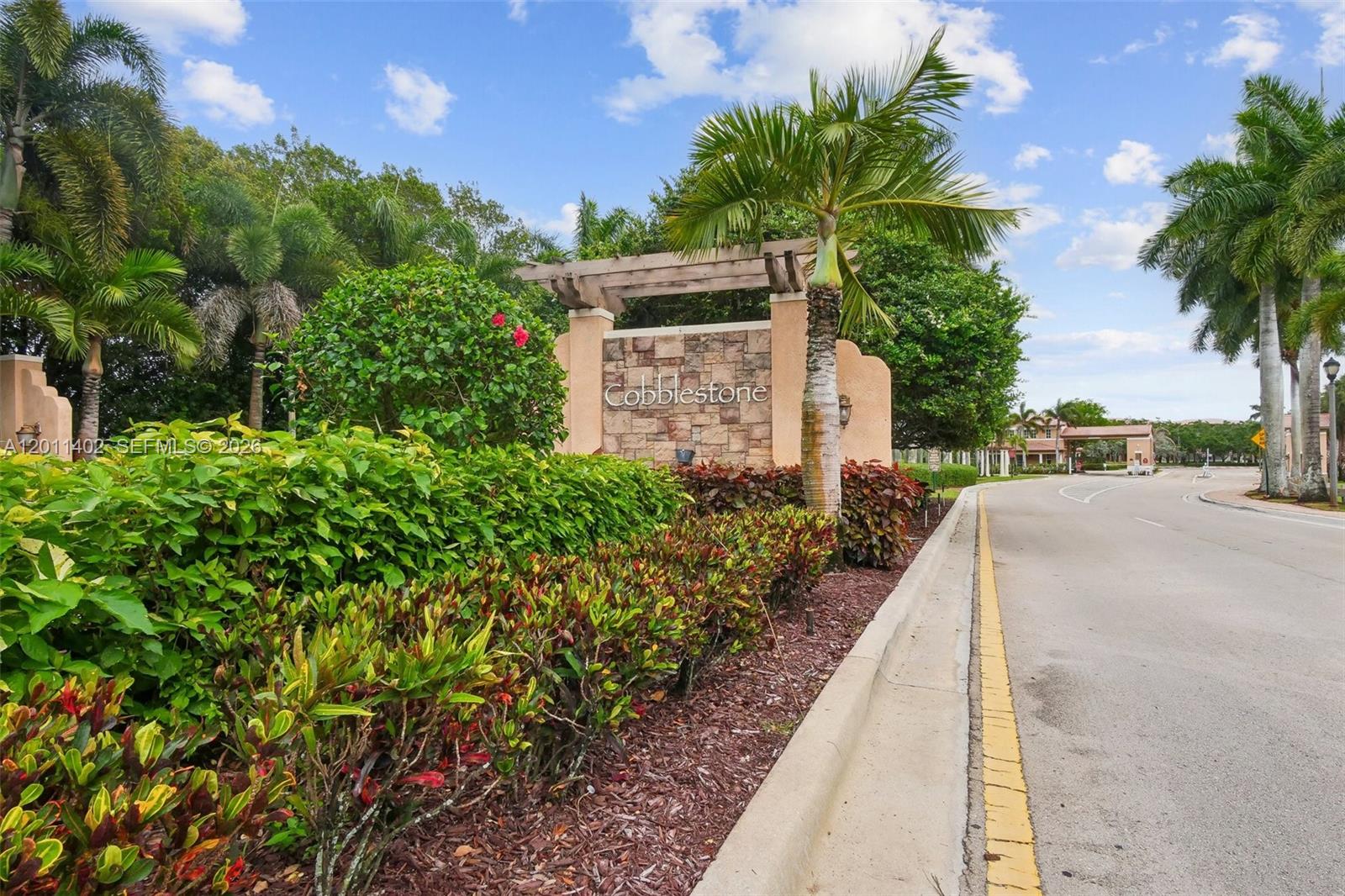 A perfect opportunity to own a beautiful 3-bedroom, 3-bathroom ground-floor unit (No Stairs) located in desirable gated community of Cobblestone with 24/7 security. This move-in ready home features an open-concept layout with spacious living and dining areas, elegant Double French Doors entry, and generous kitchen space with wood cabinets, granite countertops, and stainless-steel appliances. The primary bedroom offers a large walk-in closet, and all bedrooms are very well-sized. Enjoy tile and laminate flooring throughout, impact windows, and plenty of storage. Conveniently located just one block from the clubhouse, residents enjoy resort-style amenities including pool, gym, clubhouse, and tot lots. Newer Community built in 2013. Maintenance Payment includes cable, internet, and alarm system. Prime location near I-75 (just one traffic light away), Pembroke Gardens Mall, shopping, dining, golf courses, Medical Facilities, and A-rated schools. Pets are welcome!