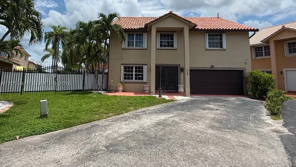 Spacious 4-bedroom, 2.5 bath home in the highly desirable Country Lake Park community! The garage has been  converted into an additional bedroom (#5), offering extra living space that is perfect for a large family, guests, a home office, or flex space. Situated on one of the largest lots in the community (approximately 6,600+ sq. ft.), this property offers an oversized backyard with endless possibilities for entertaining, a pool, playground, boat storage, or future outdoor enhancements. The home features a functional floor plan, generous living areas, and is conveniently located near excellent schools, parks, shopping, dining, and major highways. Don't miss this rare opportunity to own a home with both extra interior space and an exceptional lot size in one of Hialeah's most sought-after neighborhoods.