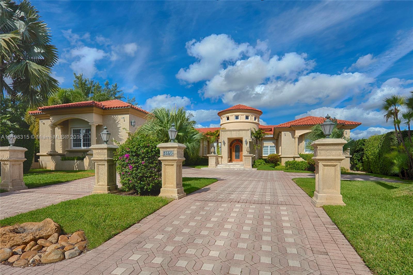 Located on beautiful Biscaya Island, this contemporary Mediterranean waterfront home designed by award-winning architect Barry Sugarman sits on a 18,400 SF lot & features an elegant foyer w/rotunda ceiling, exquisite oak wood floors, open dining & living areas with 17’ ceilings. Gourmet kitchen w/top appliances. Master suite boasts full his/hers walk-in closets & his/hers master baths with open views to the Intracoastal. Manicured landscaping, Intracoastal views & direct access to bay complete this home.
