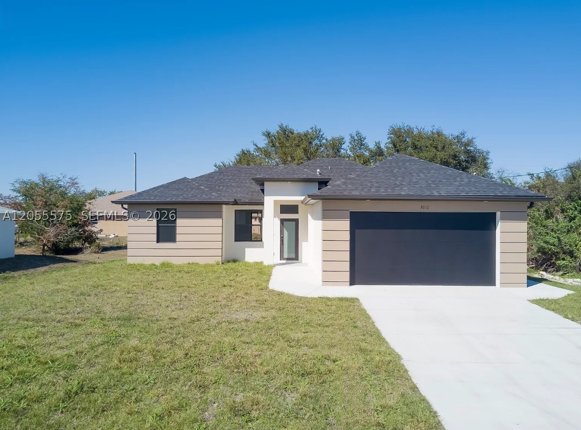 Welcome to this beautiful new construction home in Lehigh Acres, offering 3 spacious bedrooms and 2 modern bathrooms. Thoughtfully designed with comfort and style in mind, this home features an open-concept layout, porcelain tile flooring throughout, and quality finishes in every room.

The kitchen is the heart of the home, showcasing quartz countertops, stainless steel appliances, contemporary cabinetry, designer fixtures, and under-cabinet lighting—perfect for both everyday living and entertaining.

Additional features include an indoor laundry closet and a convenient location close to shopping, dining, schools, and major roadways. Move-in ready and built for modern living, this is a home you won't want to miss. Schedule your private showing today!