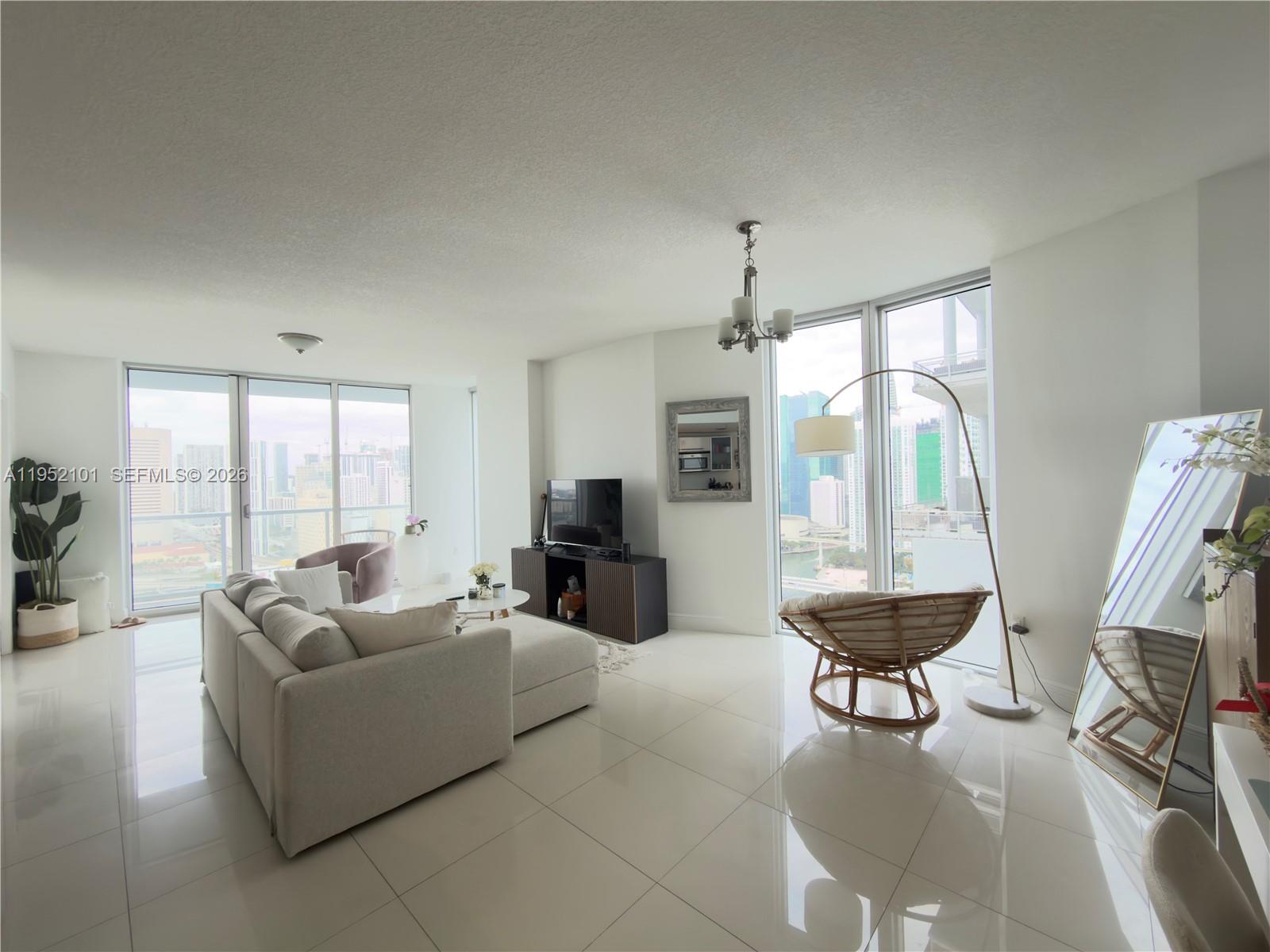 Breathtaking water views from these 3 beds, 3 bath corner unit on the 27th floor with 180-degree river and city views and a wraparound balcony. The Italian-designed kitchen features an island, stainless steel appliances, and granite countertops. Floor-to-ceiling impact windows provide ample natural light. Large closet space. Located in the vibrant Brickell area, just steps from restaurants, offices, nightlife, metro rail, Publix & Brickell City Centre.