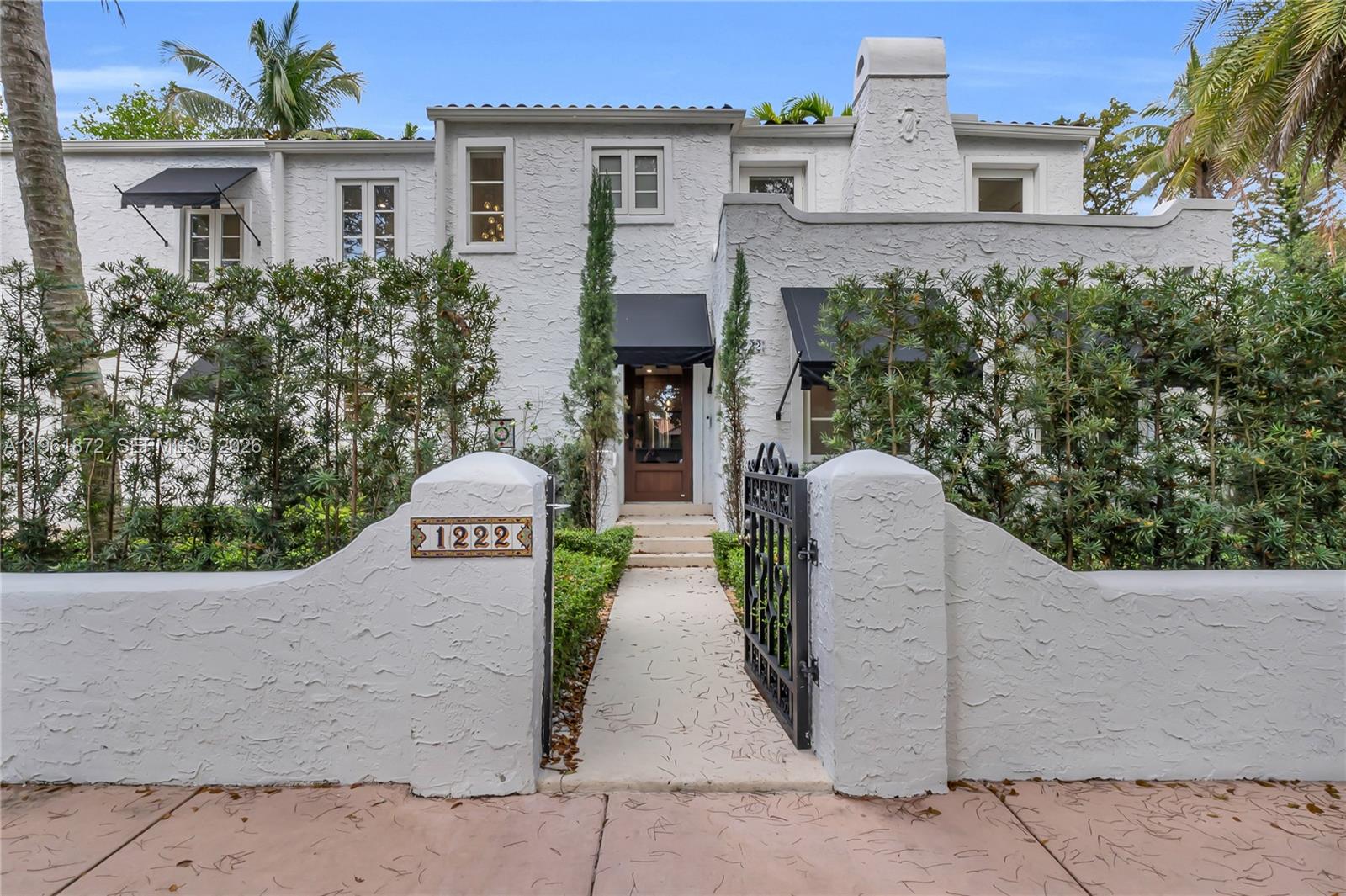 Owner financing available at below market rate! Experience timeless elegance in this stunning 1926 Spanish residence, perfectly situated in the heart of exclusive Coral Gables just half a mile from the Granada Golf Course. This beautifully reimagined home, featuring 4 bedrooms, 3 bathrooms, a versatile flex area ideal for a home office, & inviting outdoor spaces designed for effortless entertaining. Meticulously renovated w/exceptional attention to detail, the home seamlessly blends historic charm w/modern sophistication. Recent upgrades include a new roof, fully updated kitchen & bathrooms, new electrical/plumbing/laundry, impact windows/doors, multiple A/C systems w/new ductwork, custom lighting, built-in speakers & smart home features. The chef’s kitchen has Bosch appliances, designer quartz countertops, & an expansive built-in bar perfect for gatherings. Additional highlights include beautifully refinished hardwood floors, custom closets, ample garage & storage shed, thoughtfully designed landscaping w/ Chicago brick & coral tile, full sprinkler & exterior lighting. The crown jewel of the home is the rare, oversized primary suite—a private retreat featuring a spacious walk-in closet & a luxurious spa-inspired bathroom adorned w/Versace tile, a freestanding soaking tub, rain shower, & dual vanities. A truly one-of-a-kind Coral Gables residence that captures the essence of timeless elegance while offering the comforts of modern luxury. Furniture available.
