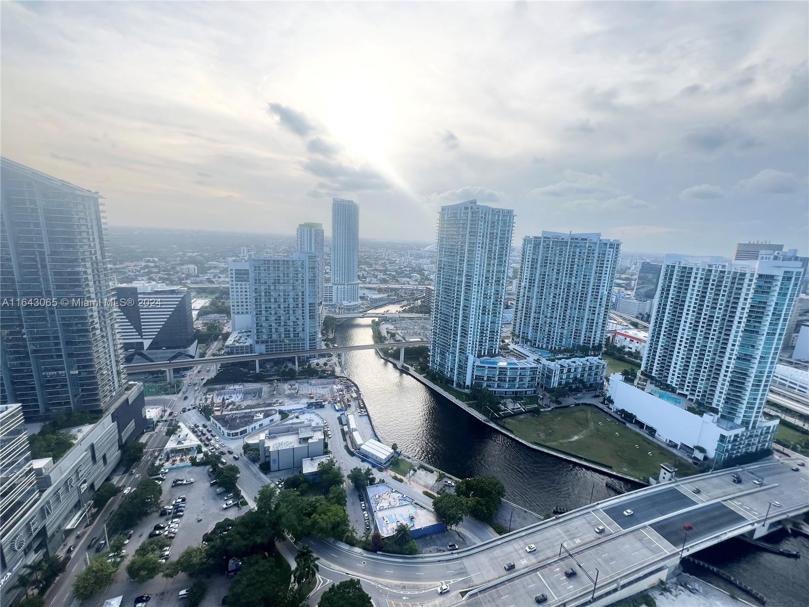 Modern and spacious 2 bedrooms & 2 full bathrooms condo on a 38th floor with amazing panoramic city & Miami River views from its large balcony, in the prestigious Reach high rise at Brickell City Center full amenity building sitting on a 1/2 acre deck with tropical gardens, BBQ, 2 large pools, children play area, spa & gyms. Unit features equipped walk-in closets, floor to ceiling sliding glass doors, modern Italian style kitchen & bathrooms cabinetry, top of the line SS Bosch appliances, marble floor throughout