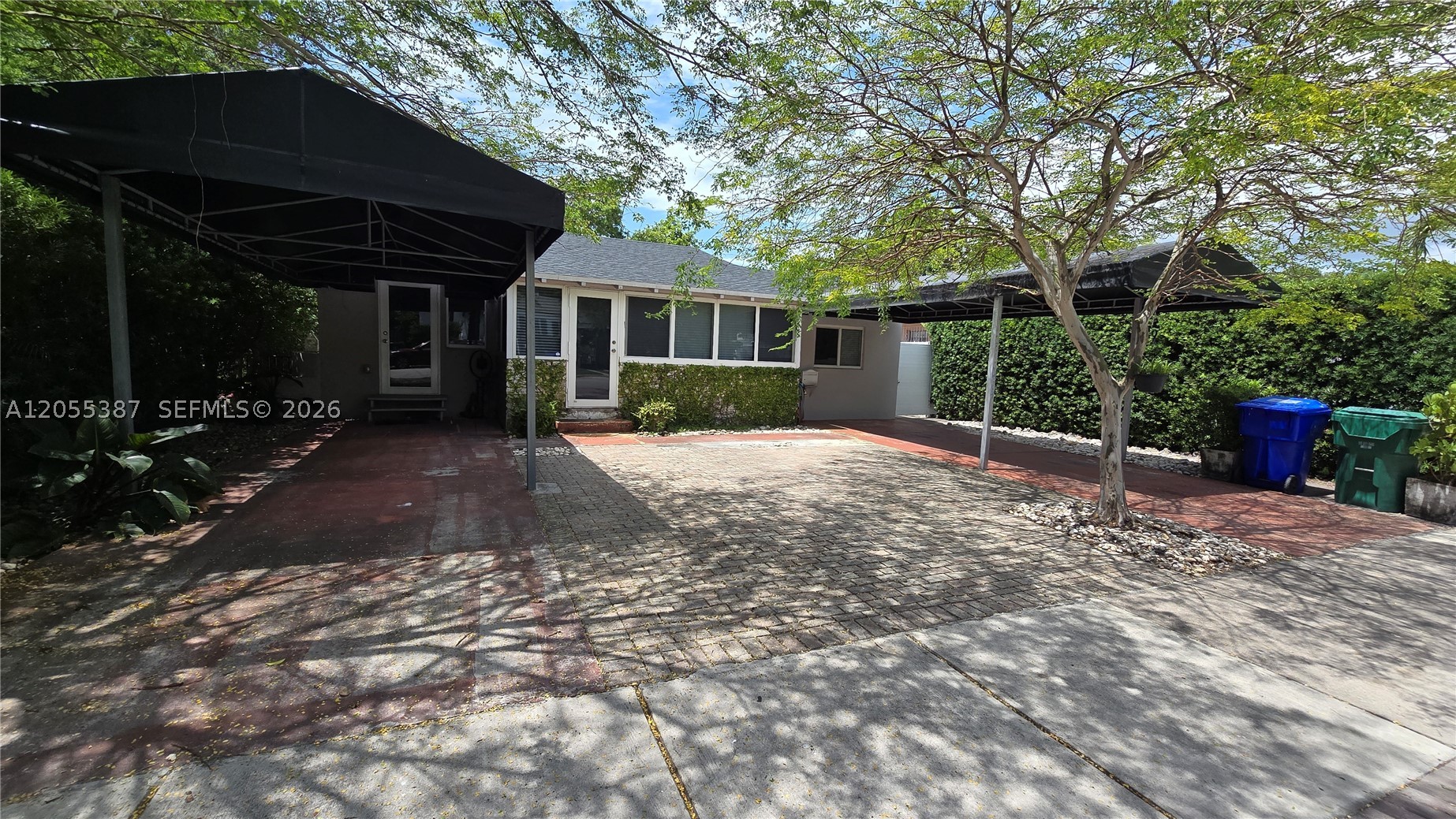 Located in the heart of Silver Bluff Estates, this home offers effortless South Florida living just one block from the Underline and minutes from Coconut Grove, Brickell, Coral Gables, airport, beaches, and major shopping. Enjoy a private tropical backyard with mature avocado and mango trees—perfect for entertaining or relaxing. The home features impact windows and entry, a new roof (2023), updated plumbing (2015), and upgraded electrical (2020). Flexible layout easily accommodates multi-generational living, guests, or rental income. Renovated bathrooms, bright living spaces, enclosed front porch, and ample parking add comfort and style. A rare opportunity combining versatility, investment potential, and lasting value in one of Miami’s most desirable neighborhoods.