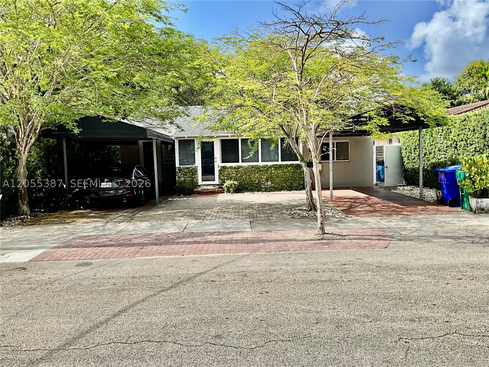 Located in the heart of Silver Bluff Estates, this home offers effortless South Florida living just one block from the Underline and minutes from Coconut Grove, Brickell, Coral Gables, airport, beaches, and major shopping. Enjoy a private tropical backyard with mature avocado and mango trees—perfect for entertaining or relaxing. The home features impact windows and entry, a new roof (2023), updated plumbing (2015), and upgraded electrical (2020). Flexible layout easily accommodates multi-generational living, guests, or rental income. Renovated bathrooms, bright living spaces, enclosed front porch, and ample parking add comfort and style. A rare opportunity combining versatility, investment potential, and lasting value in one of Miami’s most desirable neighborhoods.