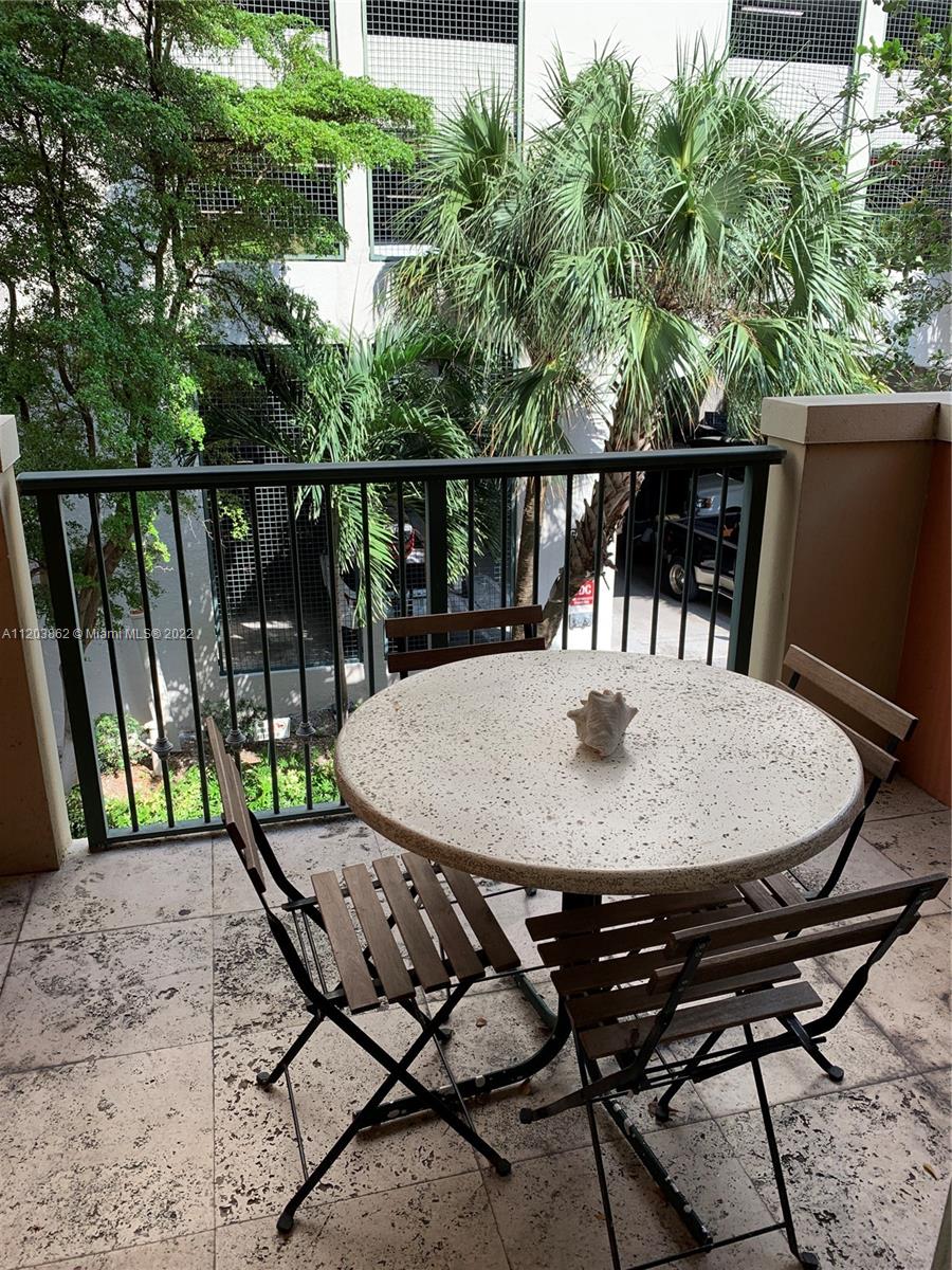 BEST LOCATION!!!!!!!!!!  Coconut Grove's lowest price bay view condo! Dog OK.  There are yacht clubs, marinas, parks, and a public sailing club directly across the street. Ritz Carlton, restaurants, movies, Fresh Market, CVS, art galleries, UPS store all within walking distance. Condo is 650 sq. ft. and has a beautiful balcony. Investors: rent for any length of stay, even nightly rentals allowed. Room service, valet, lobby restaurant, and concierge