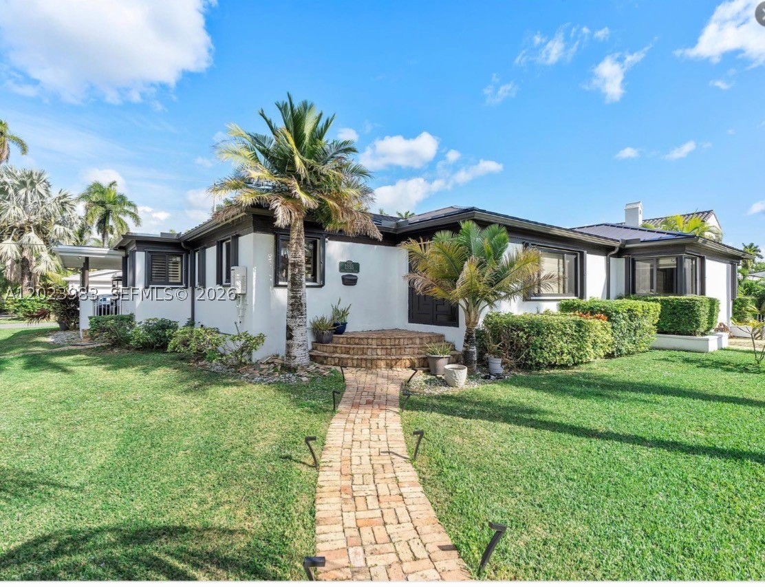 This is a SHORT SALE! Gorgeous Hollywood Lakes Home 4/3.5 w pool. Corner double lot Minutes to the beach, main house is 2120 sq ft., has a inlaw quarters and a guest house. New Metal Roof, Hurricane Impact Windows and Mediterrian Doors. Natural Gas Generator, 60 Solar Panels, AC is 2023, Gas stove, Heated Pool. Beautiful Inside and Out totall remodeled! Outside BBQ Area full state of the art chef outdoor kitchen. Make an Offer Owners Motivated.