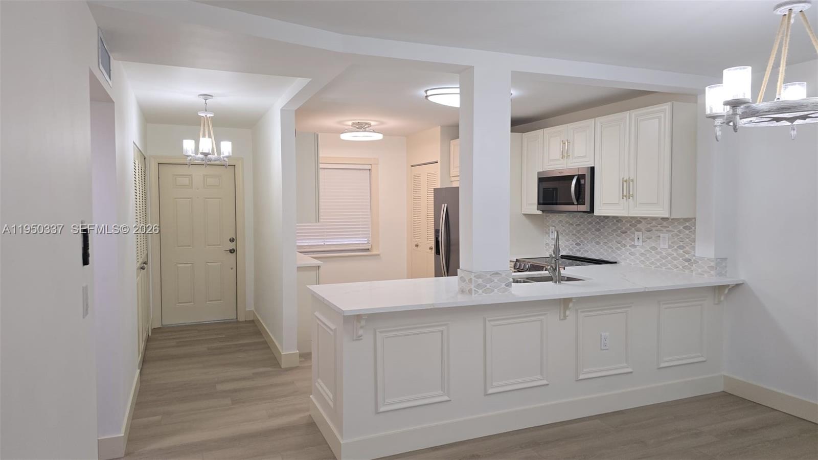 Very bright and beautifully updated 1-bedroom, 2-bath residence in desirable Palm Lakes, a 55+ community. This move-in-ready unit features brand-new cabinetry throughout, including the kitchen and bathrooms, updated closets, new vinyl flooring, and a bright open-concept kitchen including brand new refrigerator, combo washer/dryer, dishwasher and microwave oven, ideal for everyday living and entertaining. Additional upgrades include new ceiling fans, contemporary lighting, and updated electrical outlets throughout the unit.

The primary bedroom offers a walk-in closet and direct access to an enclosed patio with peaceful water views. Bathrooms have been tastefully renovated, and the A/C is less than 2 years old. This unit is very stylish, and thoughtfully upgraded—ready for its new owner.

Enjoy a well-equipped clubhouse with amenities including swimming pool, tennis courts, and more. Conveniently located near supermarkets, shopping centers and just minutes from hospitals. A great opportunity for comfortable and serene living. This unit combines comfort and convenience in a serene setting.

 ASSOCIATION REQUIREMENTS: 650+ credit for ALL applicants, min income of $40k, 2 small pets 20lbs max. No rentals 1st year