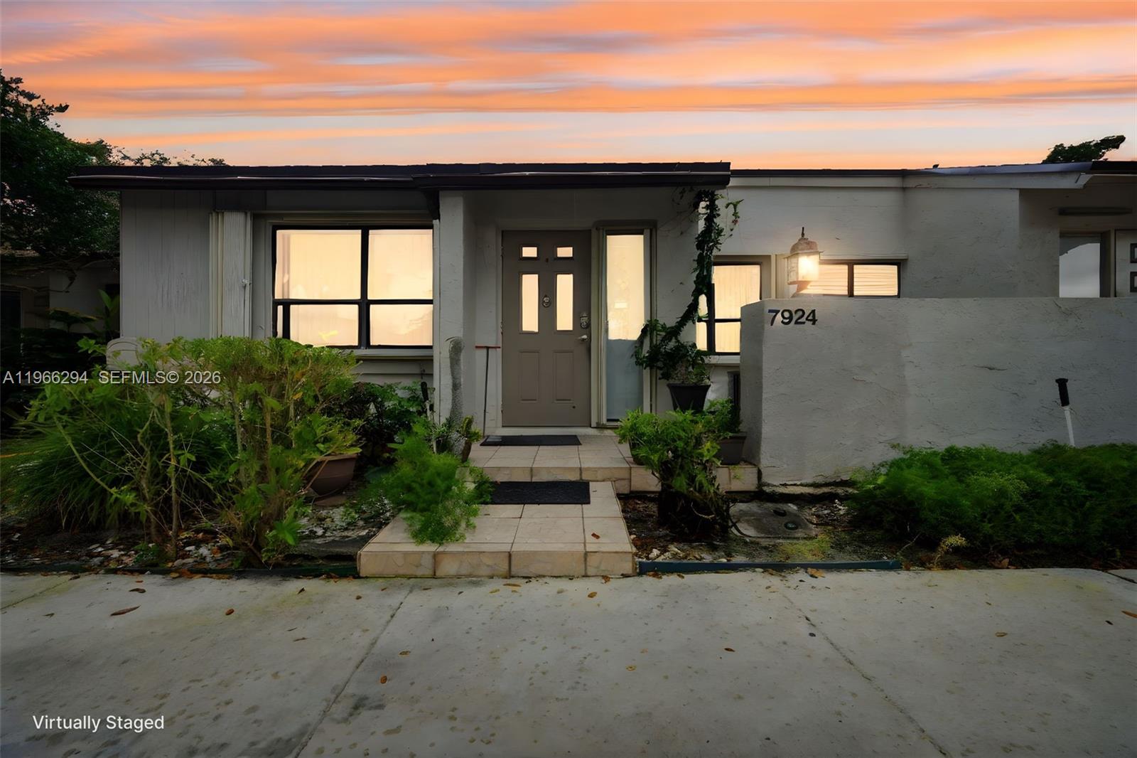 BEST VALUE LAKEFRONT VILLA IN ALPINE WOODS OF JACARANDA! LOWEST PRICED 2/2 CURRENTLY AVAILABLE AND PRICED FOR A QUICK SALE. THIS ONE-STORY 2 BEDROOM 2 BATH WATERFRONT VILLA FEATURES A NEW ROOF (2023), NEW A/C (2025), NEW TILE FLOORING, FRESH INTERIOR PAINT, BASEBOARDS, NEW NEST THERMOSTAT, AND NEW MODERN BASEBOARDS ANSWER NEW VANITIES. ACCORDION SHUTTERS PROVIDE FULL PROTECTION, AND THE SECOND BEDROOM INCLUDES A NEW MODERN CUSTOM CLOSET ORGANIZER. THE LARGE EAT-IN KITCHEN IS A BLANK CANVAS READY TO BE REDESIGNED TO YOUR PERSONAL TASTE — A GREAT OPPORTUNITY TO CUSTOMIZE AND ADD VALUE. ENJOY HIGH VAULTED CEILINGS AND A SPACIOUS PRIMARY SUITE WITH A LARGE WALK-IN CLOSET AND SLIDING DOORS OVERLOOKING THE LAKE FOR EASY ACCESS TO YOUR PRIVATE COVERED PORCH/PATIO. RELAX WITH SERENE LAKE VIEWS AND THE CONVENIENCE OF A NEWER STACKABLE WASHER AND DRYER, PLUS A NEW WATER HEATER. TWO PRIVATELY ASSIGNED PARKING SPACES DIRECTLY IN FRONT, WITH GUEST PARKING CONVENIENTLY LOCATED ACROSS. LOW HOA. EXCEPTIONAL OPPORTUNITY TO OWN A LAKEFRONT VILLA AT THE BEST VALUE IN THE COMMUNITY! PLEASE READ BROKER REMARKS. EASY TO SHOW, REQUEST ON SHOWING TIME. SELLER MOTIVATED.