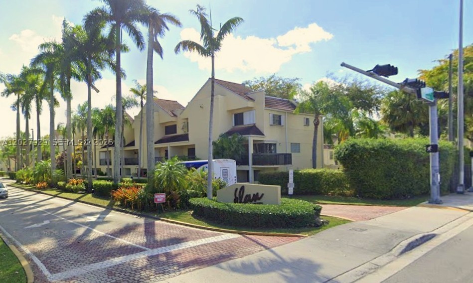 Townhouse in Elan at Calusa Village with PLENTY OF STORAGE SPACE! 2 PARKING SPACES! In-Unit Washer and Dryer! Centrally located near restaurants, shopping, and main highways! Primary bedroom with LOFT for EXTRA space for an OFFICE or storage! Walk-in Closets! En-suite with soaking tub! Features a kitchen with stainless steel appliances overlooking the living area. Spacious balcony with storage room!