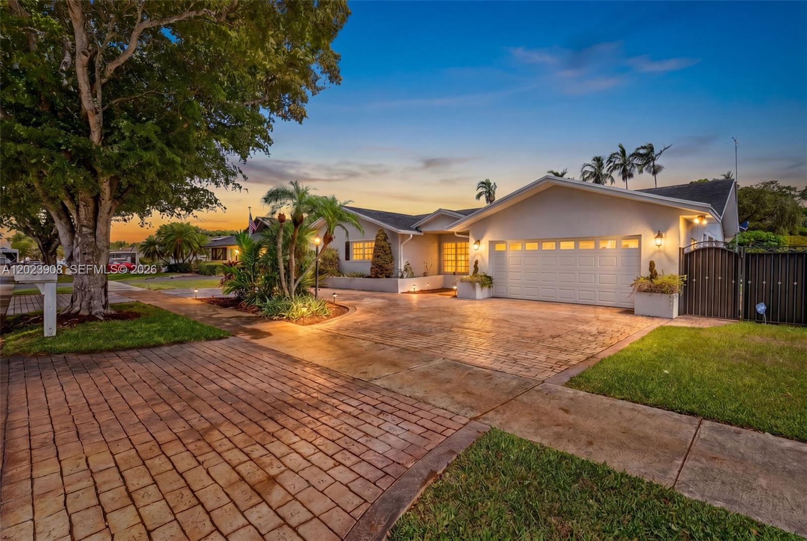 Beautifully maintained 4 Bedroom, 2.5 Bath home in a prime Miami location! Perfect for both everyday living and entertaining, this spacious residence features elegant formal living and dining rooms, volume ceilings, and a warm family room that flows seamlessly from the kitchen. The oversized kitchen is appointed with granite countertops, stainless steel appliances, and abundant cabinet space. Enjoy true indoor-outdoor living with a large screened patio. The luxurious primary suite offers a jacuzzi tub, bidet, and cedar-lined walk-in closet. Mexican tile adds character throughout, while partial impact glass, storm shutters, and a 2017 A/C provide peace of mind. The partially converted garage can easily be returned to a functional 2-car garage.