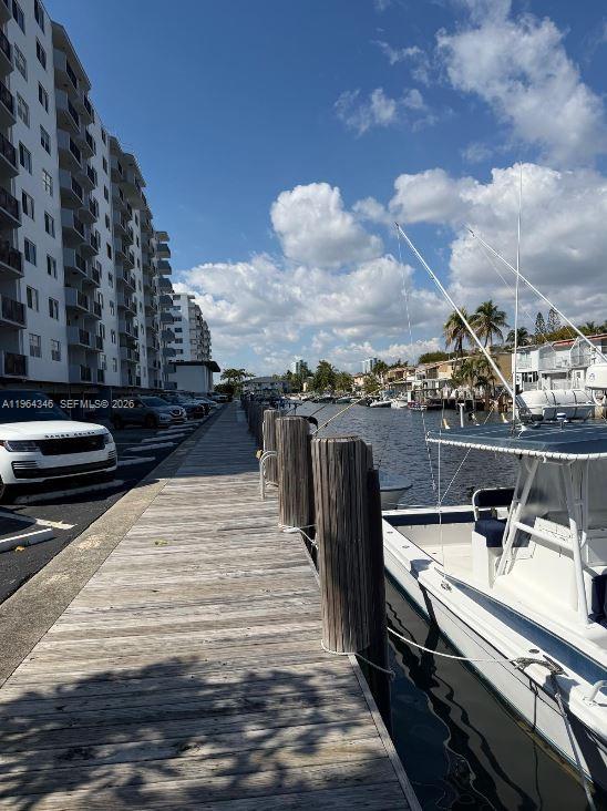 SELLER IS MOTIVATED AND JUST REDUCED THE PRICE – BRING ALL OFFERS! A true handyman special, offering a great opportunity for investors or buyers looking to renovate and add value. Rare opportunity to own a waterfront corner unit with a 25-foot dock space (Parcel 10) included, offering direct ocean access with no fixed bridges — a true boater’s dream. This east-facing 2-bedroom, 2-bath residence offers approximately 1,450 sq ft with Intracoastal views, abundant natural light, a large screened wraparound balcony plus an additional open balcony. Features include hurricane-impact windows, tankless water heater, oversized primary suite with Jacuzzi tub and walk-in closet, covered parking, guest parking, and private storage locker. The unit is in original condition and ready for your updates and personal touch, perfect for buyers looking to renovate and create value in a prime waterfront location. Just minutes to Sunny Isles Beach, parks, shopping, and dining. Incredible upside potential with dock space included.