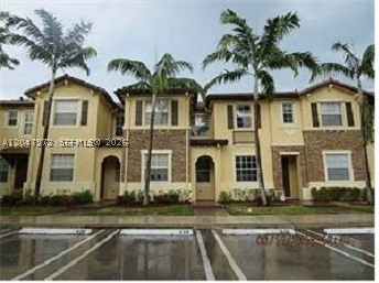 3 bedrooms and 2.5 bath townhouse. Community features an amazing club house with pool, exercise room, party room, playground. The property comes with 2 parking spaces, only 1 assigned. Washer and dryer. SS appliances. Tile and laminated floors. No rental restrictions. Subject to FIRPTA