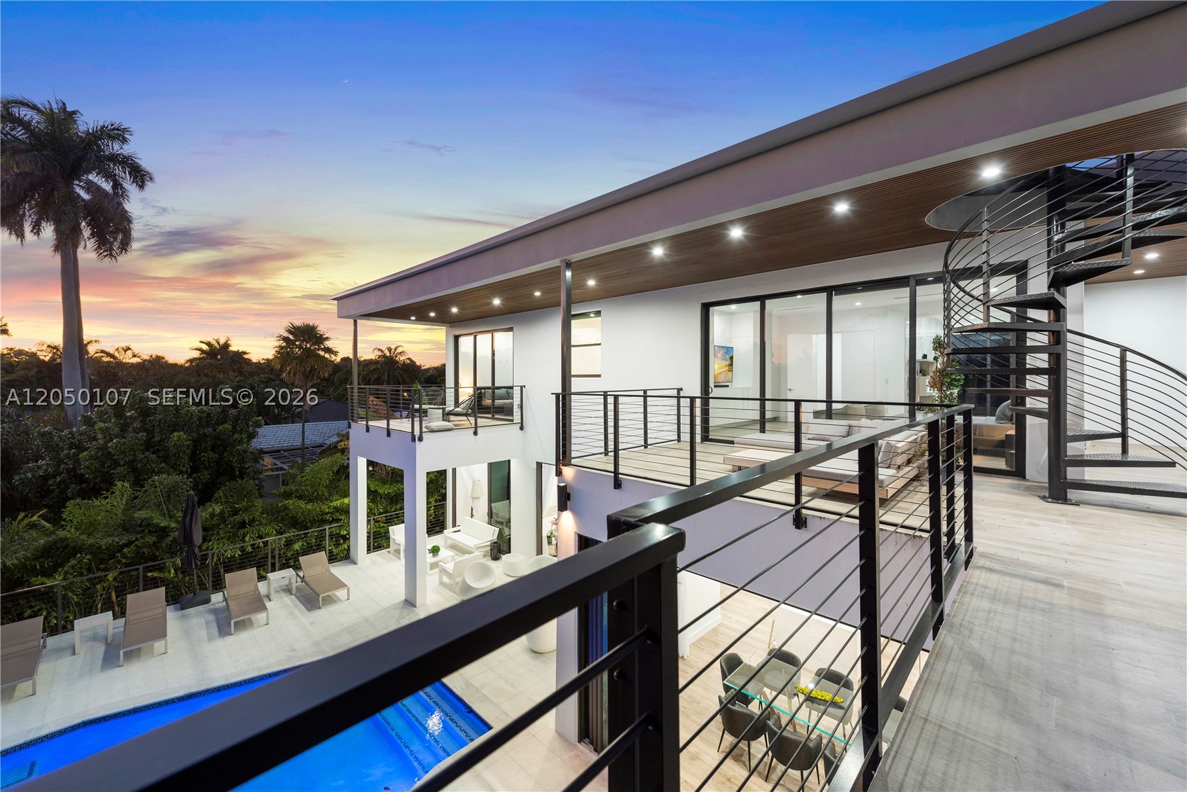 Experience modern luxury in this stunning 2021 custom-built residence in the heart of Miami Shores. This exceptional home features 6 bedrooms, 5 bathrooms, and over 4,100 SF of thoughtfully designed living space with soaring ceilings, abundant natural light, impact windows and doors, and designer finishes throughout. The open-concept layout is anchored by a chef’s kitchen with premium appliances, custom cabinetry, and an oversized island that seamlessly flows into the spacious living and dining areas. The luxurious primary suite offers a spa-inspired bath. Enjoy the ultimate South Florida lifestyle with a beautifully landscaped backyard, private pool, and an expansive rooftop terrace perfect for entertaining, relaxing, or taking in sunset and skyline views. Ideally located just minutes from Miami Country Day School, Miami Shores Country Club, the Design District, Midtown, Wynwood, Downtown Miami, and Miami Beach. A rare opportunity to own a newer construction luxury home in one of Miami Shores’ most desirable neighborhoods.