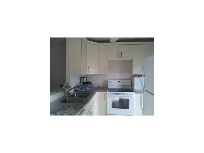 Beautifully Completely renovated nothing original everything new. unit on 2nd floor. New AC,New Hot water Heater Big Walk in closet, New Appliances. New Kitchen, Bathrooms, Floors, nothing has been left out.  Unit has a great view of the lake and fountain  from living room and balcony. Great for Snow Birds. Very Clean.