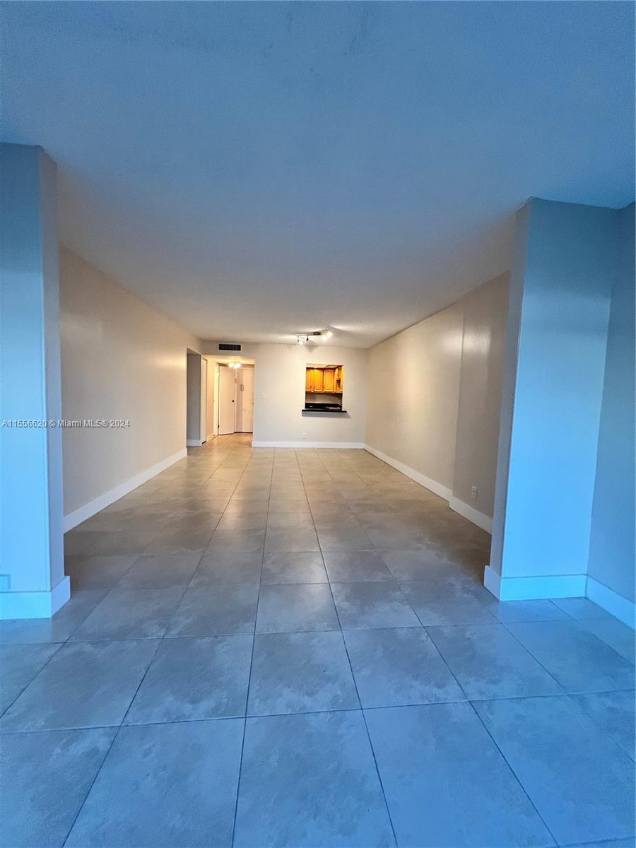 Amazing opportunity Priced below market! Great Location Spacious 1 bed 1.5 bath 915 SQ FT unit w/plenty of storage. Floor to ceiling glass windows and open balcony. Assigned secured storage spaceLess than 2 miles to the beach, close to Hollywood Boardwalk, Aventura Mall, shopping, casinos, restaurants, race tracks, Brightline, marinas, golf course and Ft. Lauderdale Airport. Additional features include one deeded parking spot, guest parking spaces, a 24-hour security guard, an on-site property manager, a heated pool, a fitness center, a party room, and a game room. HOA fees include cable, high-speed internet, and water. 40 yrs Certification completed in 2019. Investors: Can rent immediately, 3 months min. No Reserves