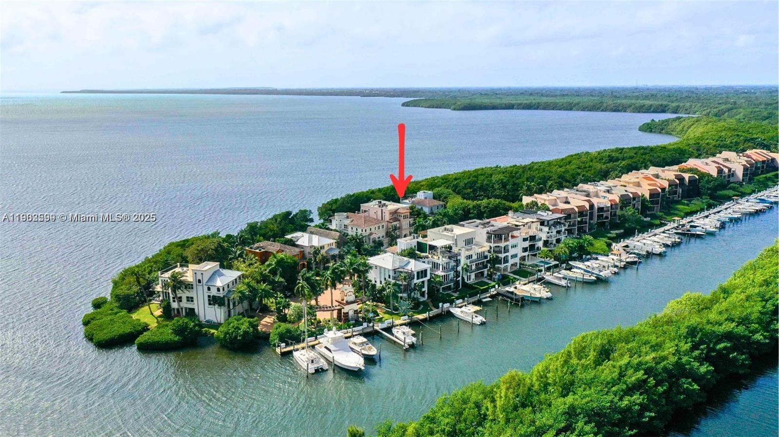 Discover the final bayfront vacant lot in exclusive Paradise Point, where every day feels like a resort getaway. Nestled within the prestigious Royal Harbour Yacht Club, enjoy 24-hour security, clubhouse, tennis and pickleball courts, heated pool and spa, fitness center, and a private beach with volleyball court. Stroll the scenic path to the bay or set sail from the full-service marina just steps away. This isn’t just land—it’s your canvas to build a custom waterfront home in one of South Florida’s most coveted gated communities.