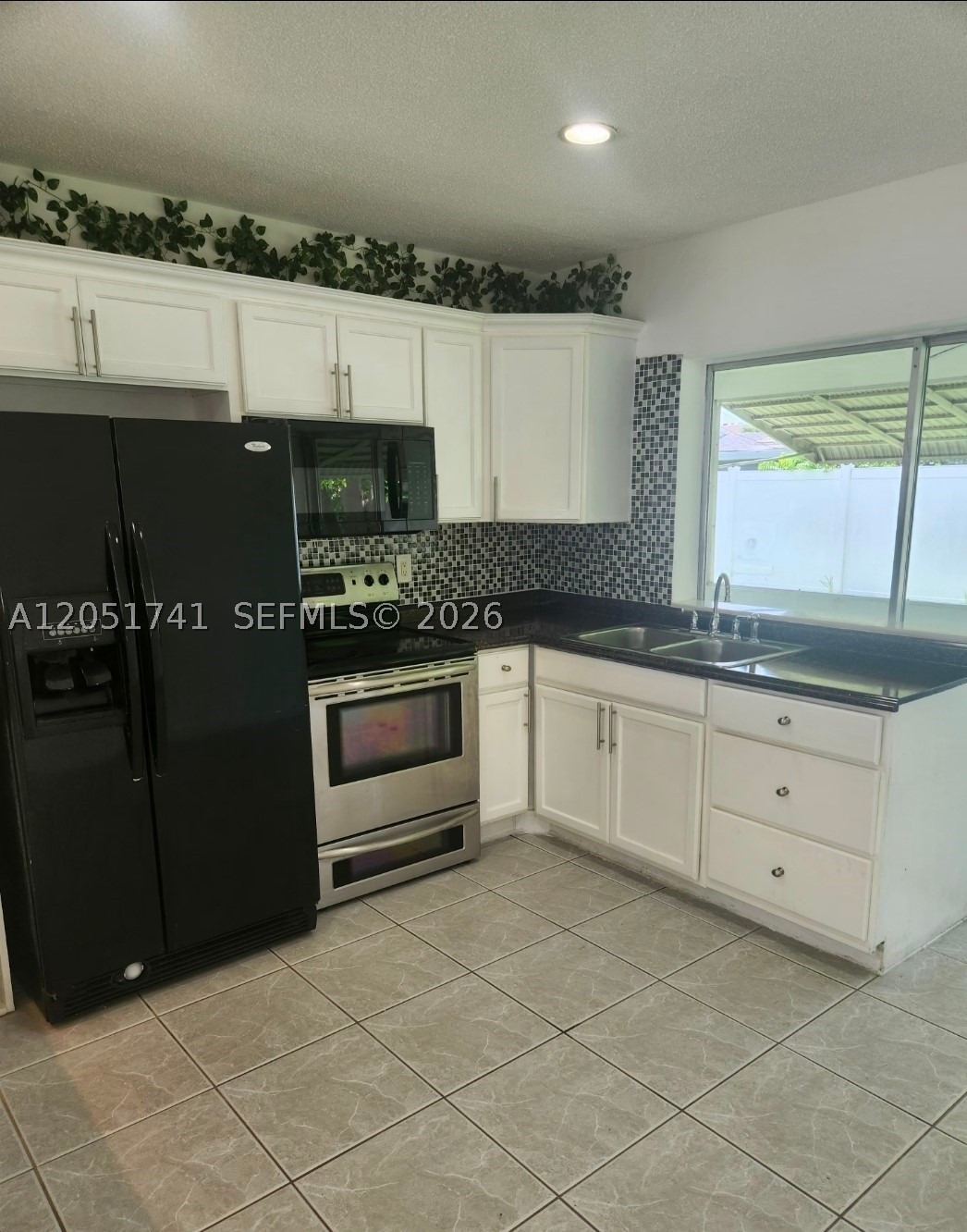 TAMARAC LAKES NORTH - Residential Lease