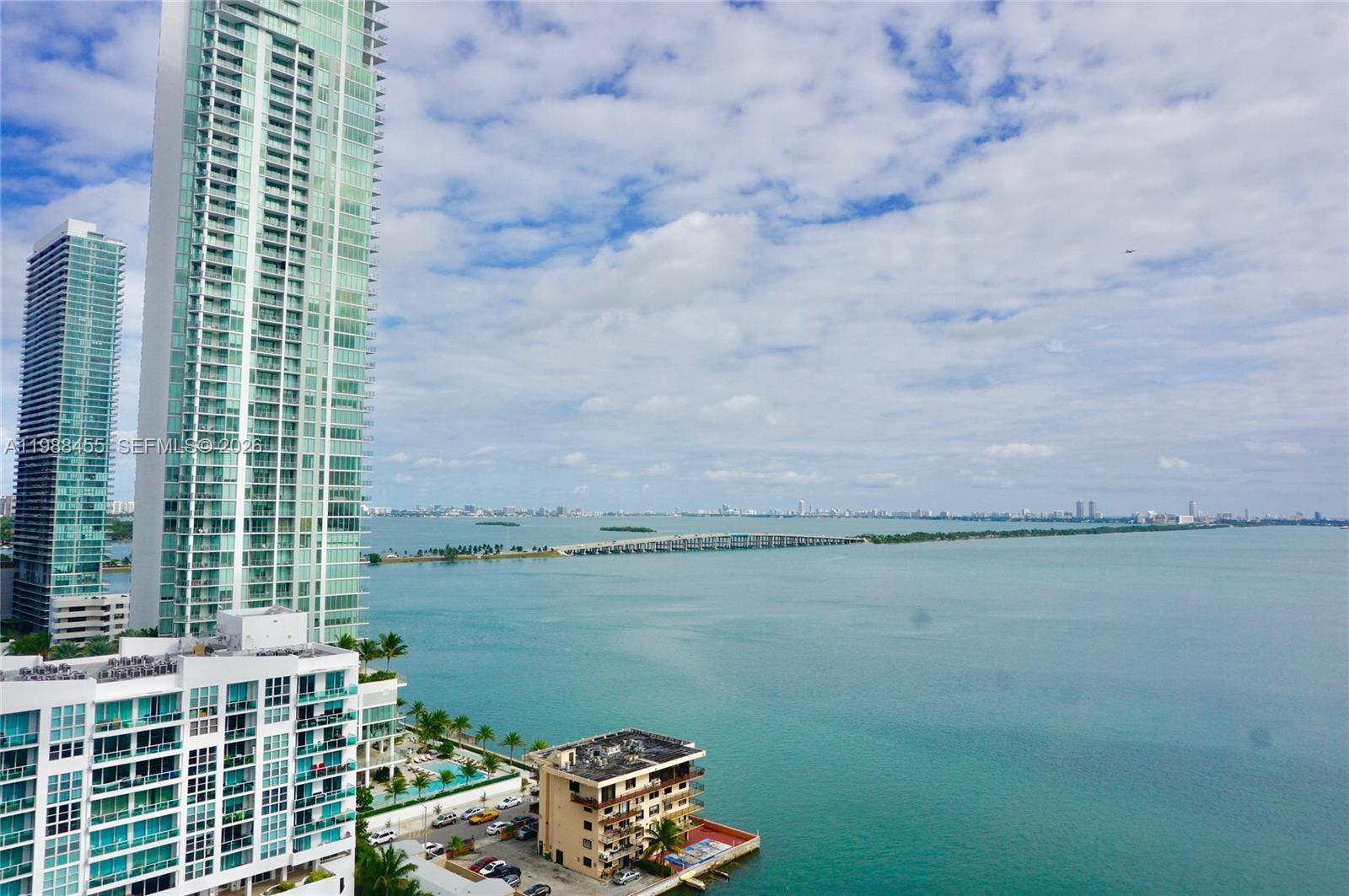 A breathtaking 1-bed, 1-bath gem in Edgewater's heartbeat. This luxury retreat boasts high-end finishes, including BOSCH appliances, marble bathrooms, roller shades, spacious closets, new flooring, and a full-size washer/dryer. Immerse yourself in stunning bay and city views from this LEED Silver certified building, featuring an energy-efficient A/C system and water heater. Experience the exclusivity of this boutique-style residence complete with electric car charging stations, a pool, spa, gym, cyber cafe, theatre, and business room. Situated in the booming Edgewater, steps away from the Intracoastal Bay and a private boardwalk, you'll enjoy easy access to Wynwood, Midtown, and the Design District for shopping and an array of restaurants.
