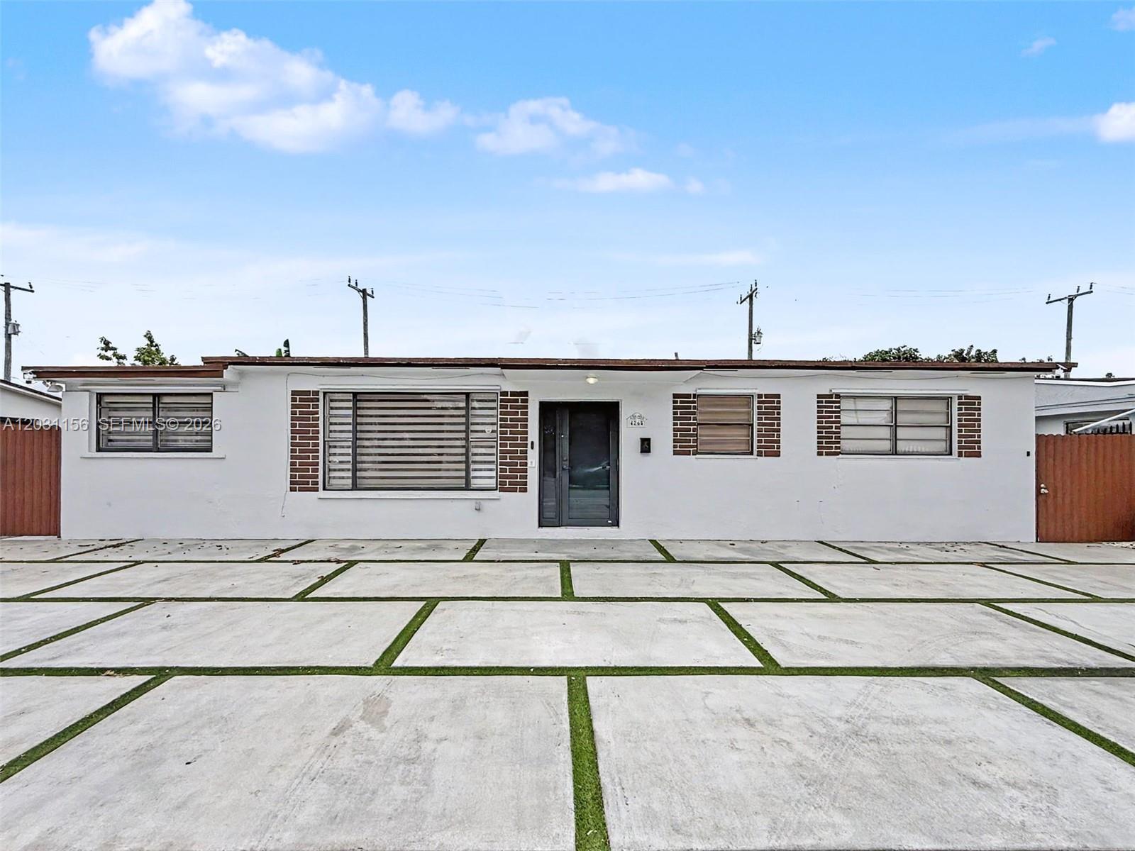 Stunning, fully remodeled property located in one of Hialeah's most sought-after neighborhoods. This exceptional home features a huge modern kitchen equipped with high-end appliances, sleek finishes, and ample space for entertaining and everyday living. Step outside to your private backyard oasis, complete with a sparkling pool and a fully equipped outdoor kitchen perfect for hosting family gatherings and enjoying South Florida living year-round. The property also includes a spacious in-law apartment with its own full kitchen, offering excellent flexibility for extended family, guests, or potential rental income. Additional highlights include a modern driveway, contemporary upgrades throughout, and meticulous attention to detail. This move-in-ready home truly has it all, just bring your toothbrush and start enjoying the lifestyle you deserve. Don't miss this rare opportunity to own a turnkey property in one of Hialeah's most desirable locations!