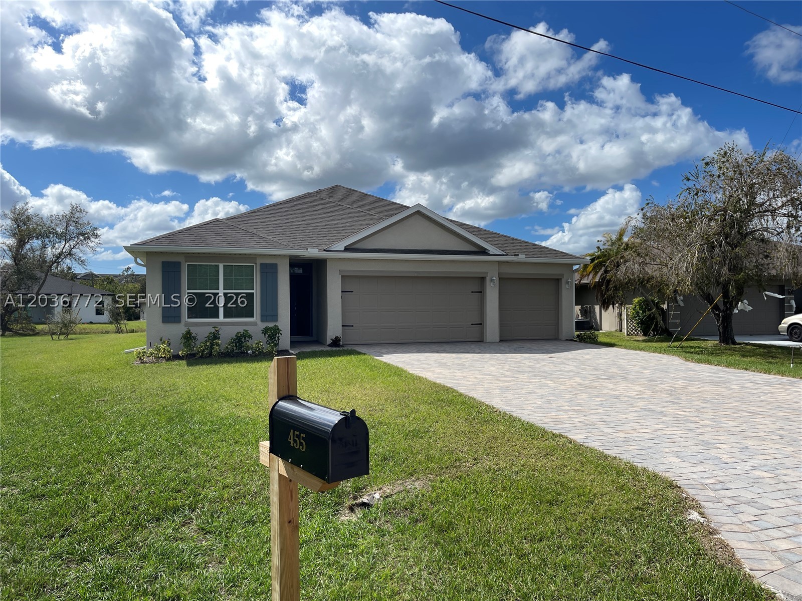 Brand-new construction! Beautiful 4-bedroom, 3-bath home with a 3-car garage offering 2,020 sq. ft. of modern living space. Features include plank tile flooring throughout the main areas, carpeted bedrooms, and a stylish kitchen with stainless steel appliances. The private primary suite boasts a spacious bath and large walk-in closet. Additional highlights include a full irrigation system and garage door opener. Located in desirable Deep Creek, just minutes from downtown Punta Gorda, shopping, dining, and local attractions.
